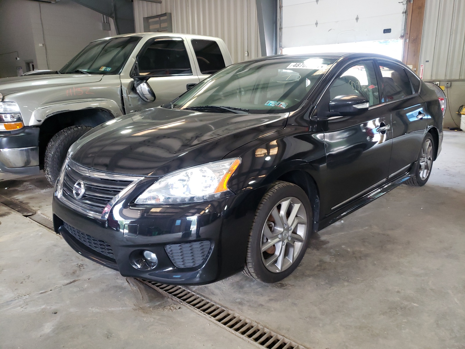 Photo 2 from auction – 2015 NISSAN SENTRA S with VIN 3N1AB7AP4FY214526