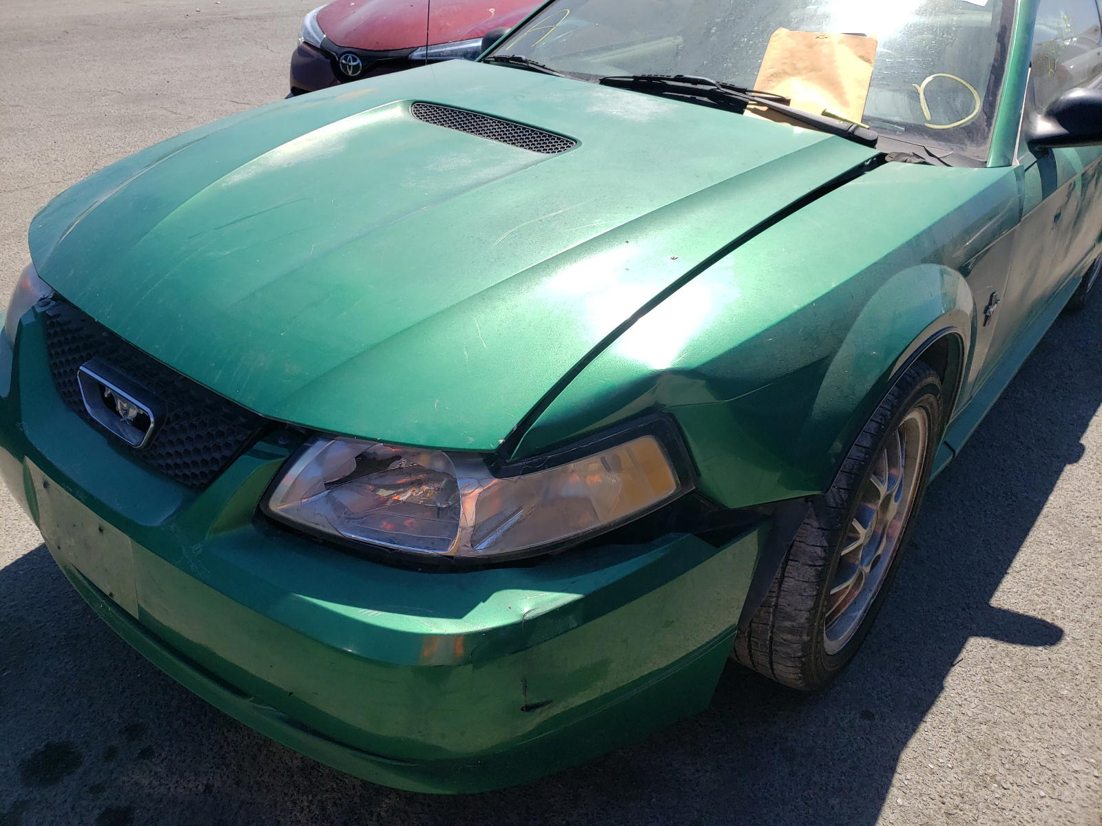 Photo 9 from auction – 2000 FORD MUSTANG with VIN 1FAFP4044YF184227