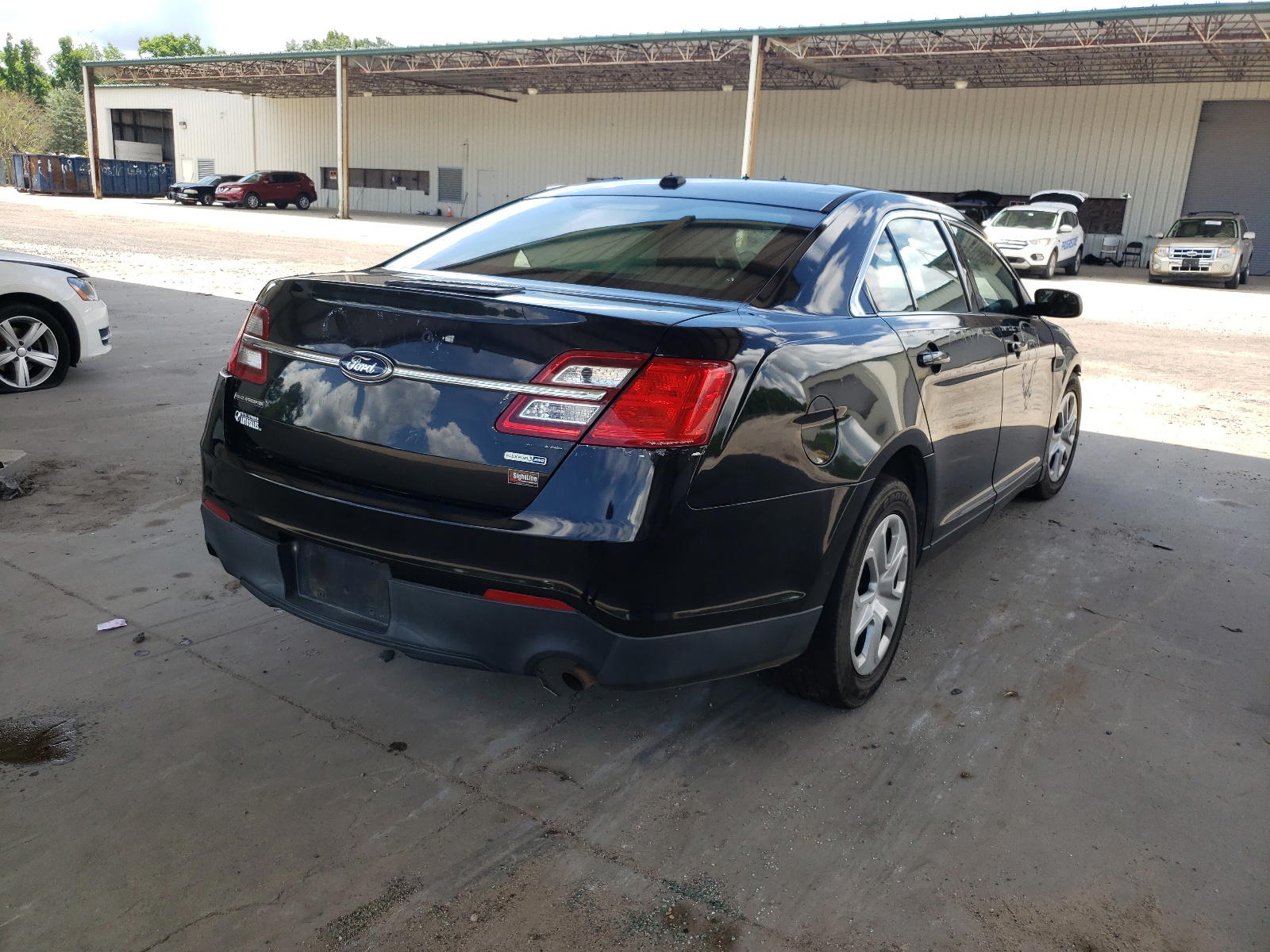 Photo 4 from auction – 2013 FORD TAURUS POL with VIN 1FAHP2M88DG110534