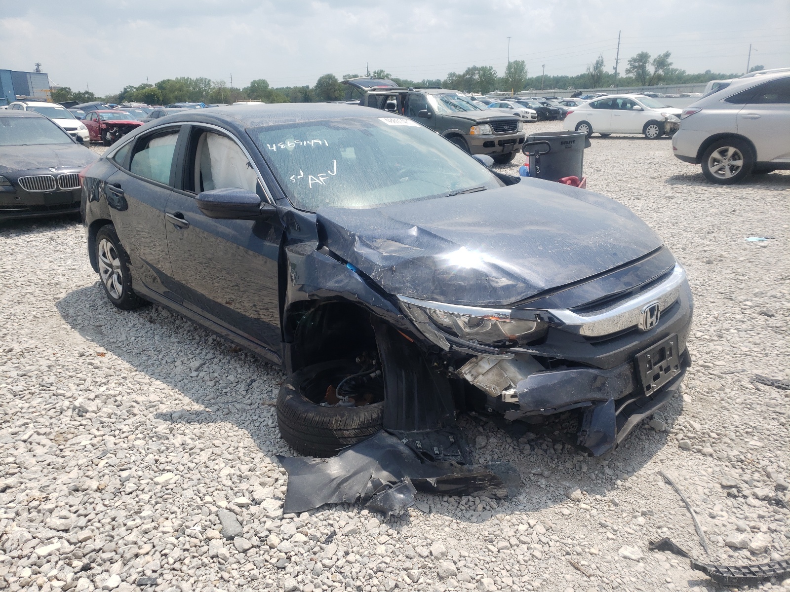 HONDA CIVIC LX 2018 with VIN 19XFC2F58JE007383 - Photo from auction