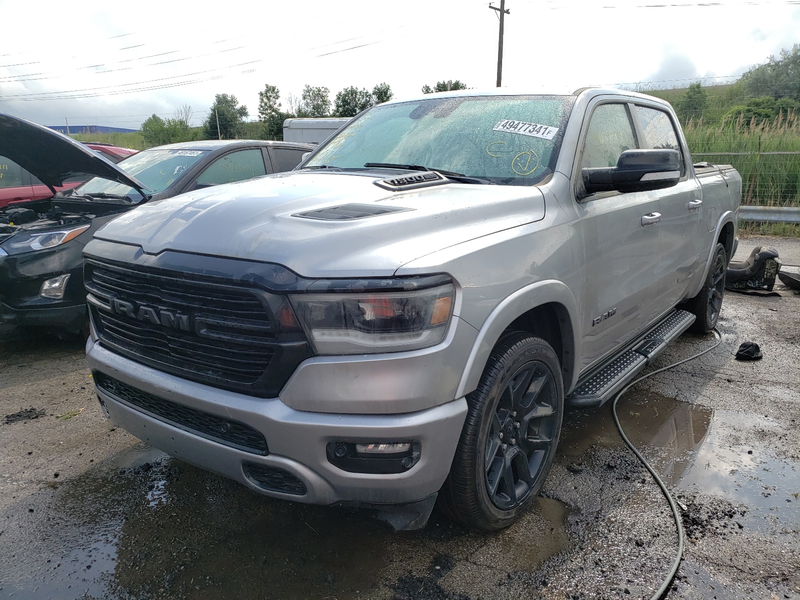 Photo 2 from auction – 2021 RAM 1500 LARAM with VIN 1C6SRFJT4MN585627