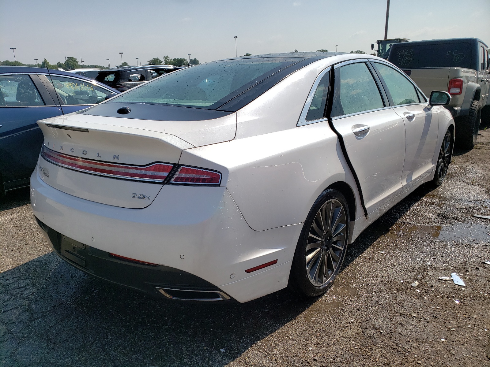 Photo 4 from auction – 2014 LINCOLN MKZ HYBRID with VIN 3LN6L2LU8ER830238
