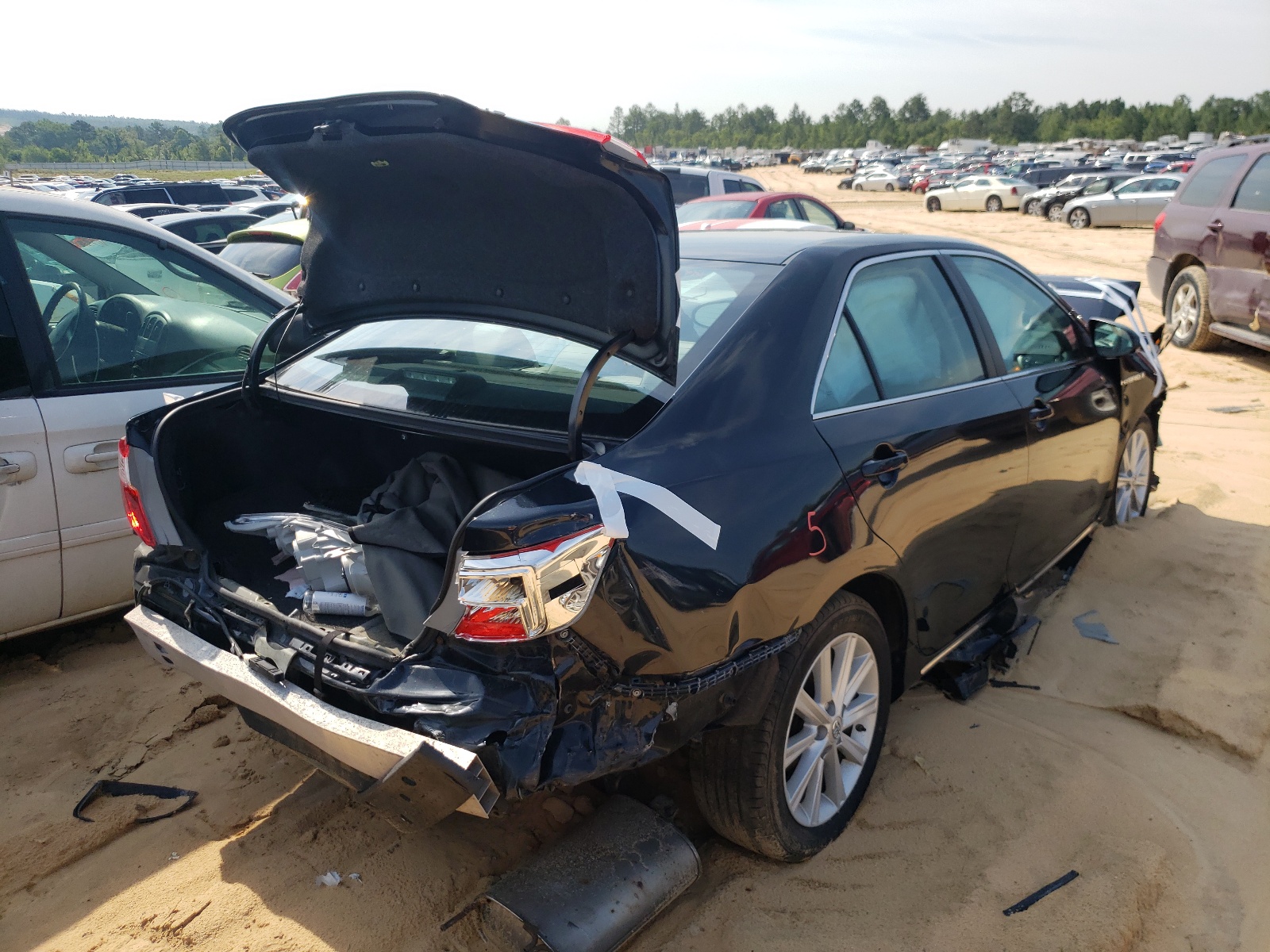 Photo 4 from auction – 2012 TOYOTA CAMRY HYBR with VIN 4T1BD1FK5CU005389