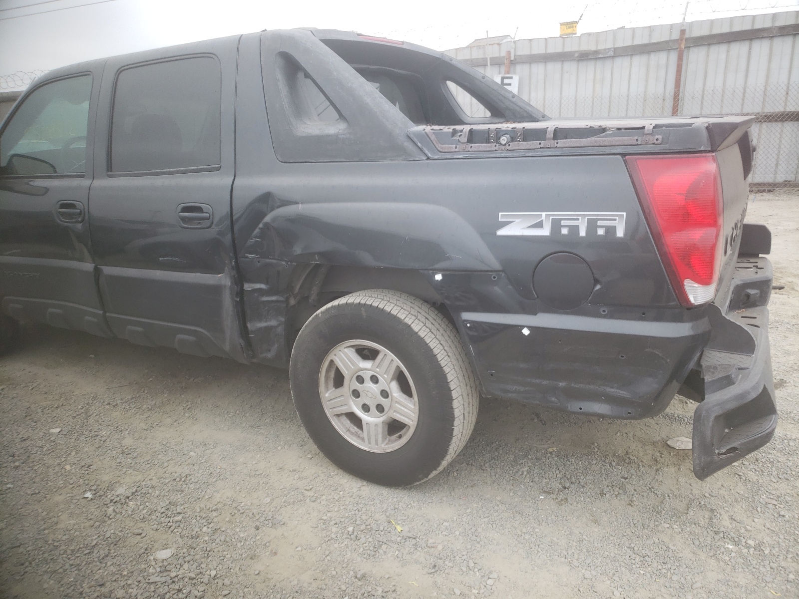 Photo 9 from auction – 2003 CHEVROLET AVALANCHE with VIN 3GNEC13T23G141068