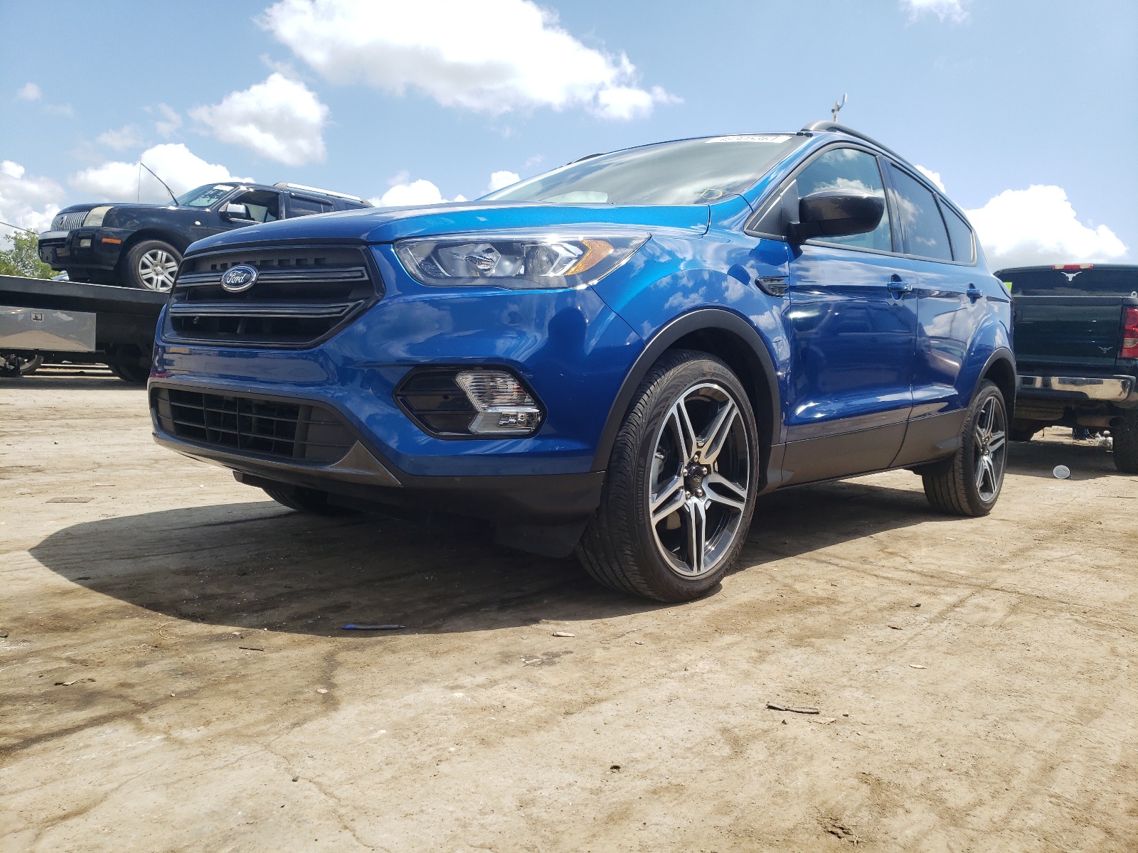 Photo 2 from auction – 2019 FORD ESCAPE SEL with VIN 1FMCU0HD5KUB47138