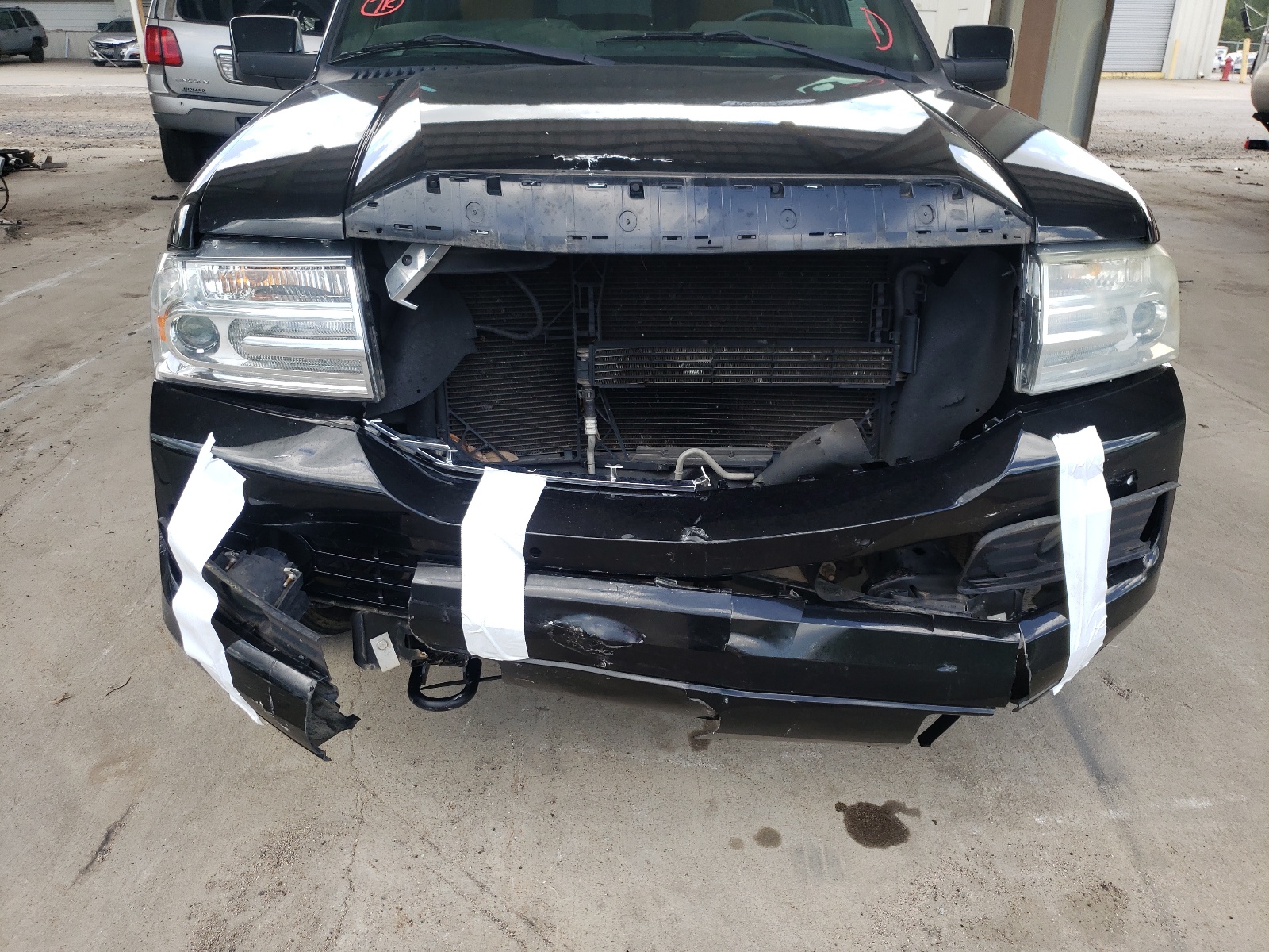 Photo 9 from auction – 2014 LINCOLN NAVIGATOR with VIN 5LMJJ3J59EEL03732