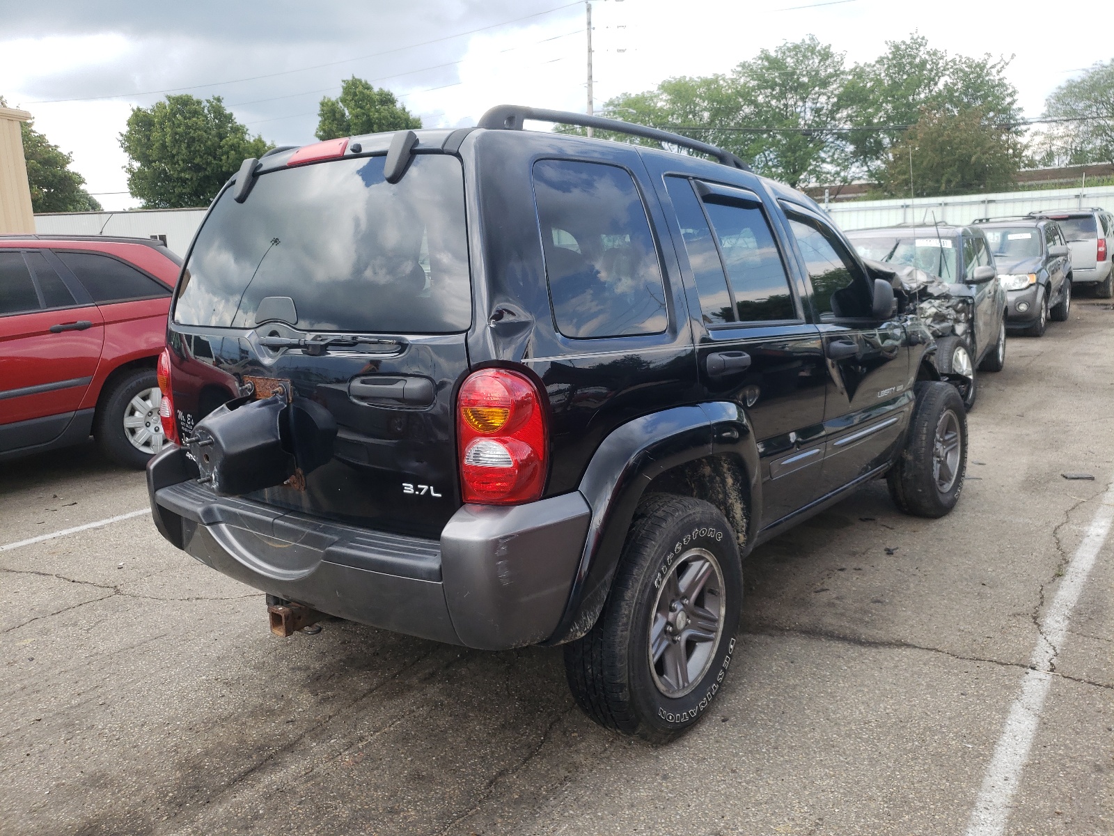 Photo 4 from auction – 2004 JEEP LIBERTY SP with VIN 1J4GL48K34W181188
