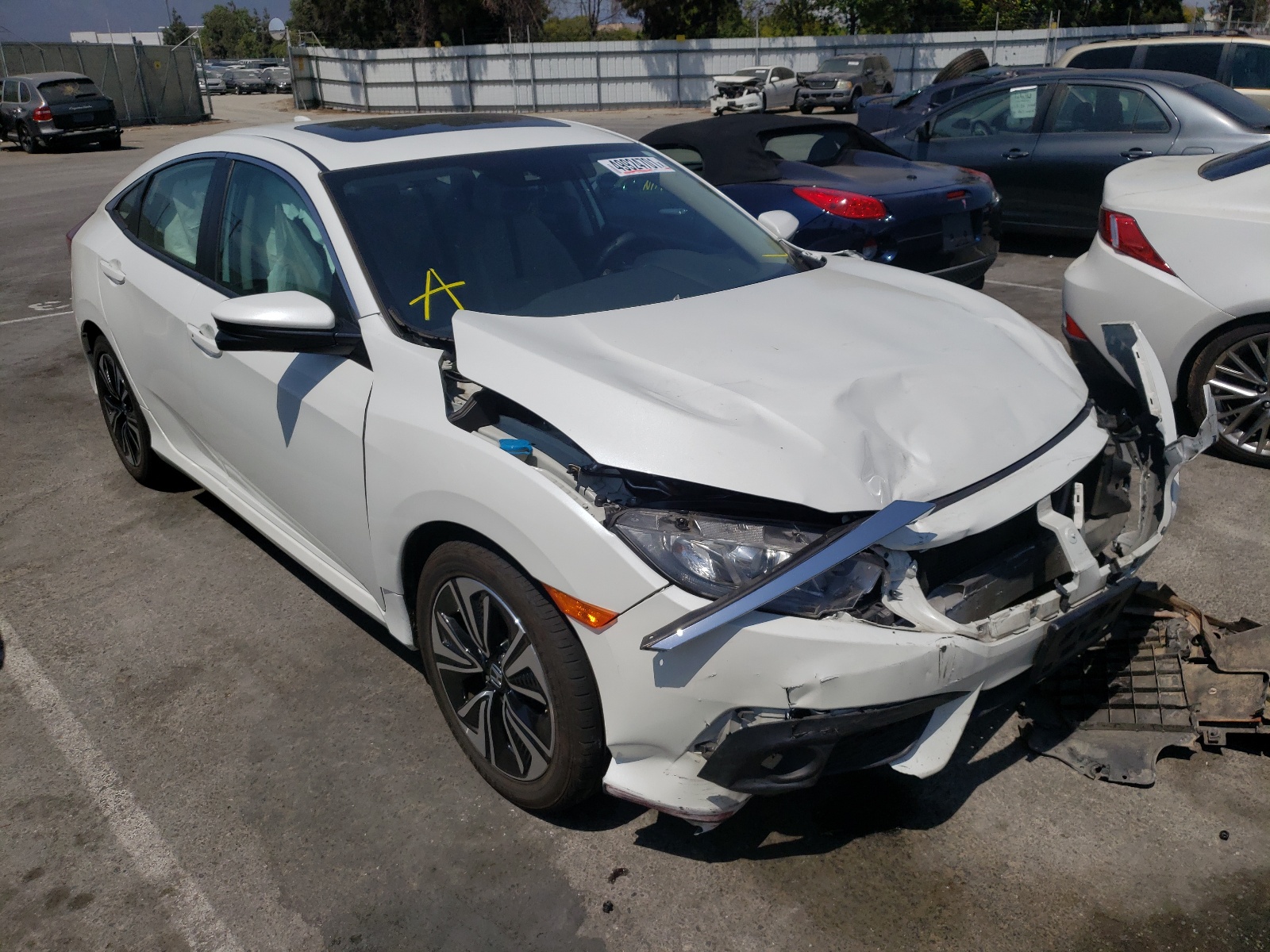 HONDA CIVIC EX 2017 with VIN 2HGFC1F46HH636142 - Photo from auction