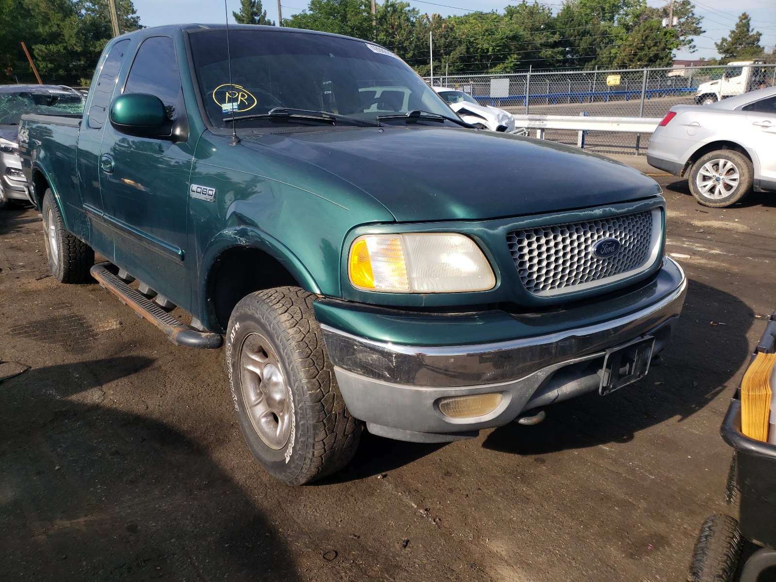 Photo 1 from auction – 1999 FORD F150 with VIN 1FTRX18LXXNA87751