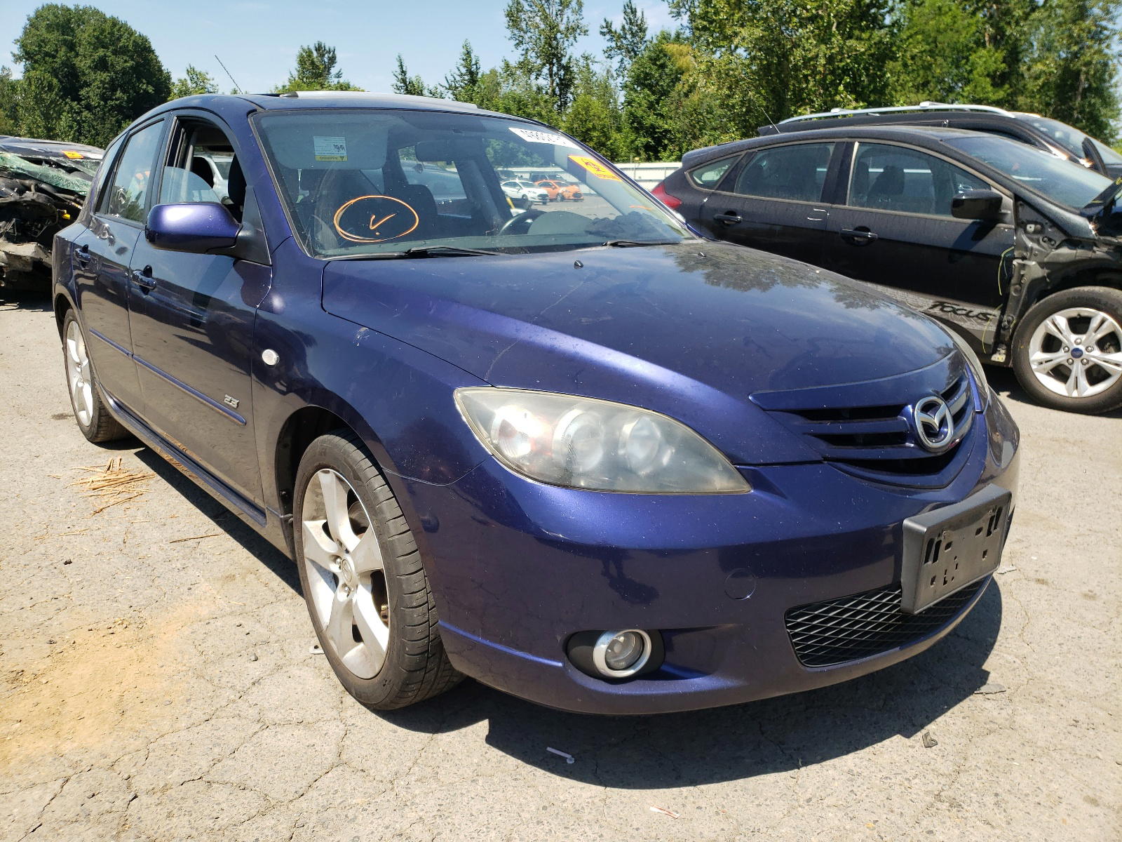MAZDA 3 HATCHBAC 2004 with VIN JM1BK143241185701 - Photo from auction