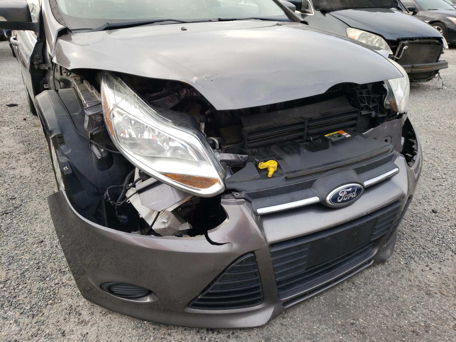 Photo 9 from auction – 2013 FORD FOCUS SE with VIN 1FADP3F25DL168718