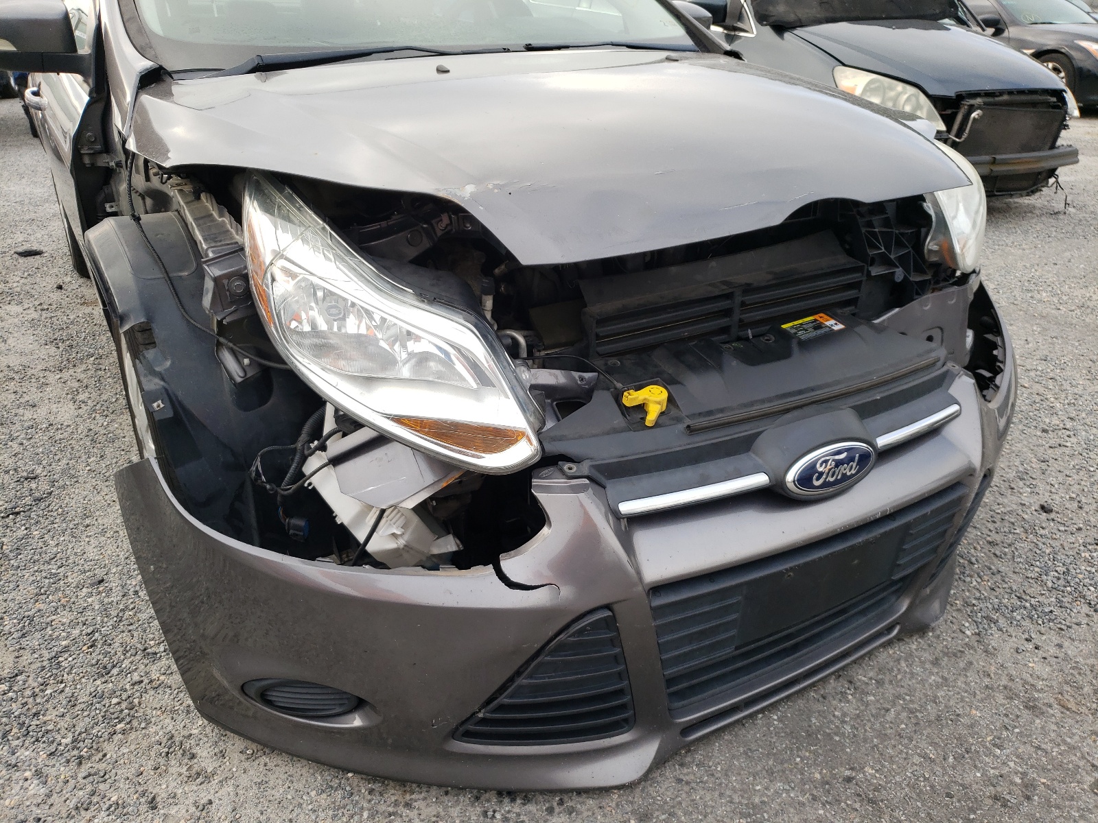 Foto 9 de la subasta – 2013 FORD FOCUS SE con VIN 1FADP3F25DL168718