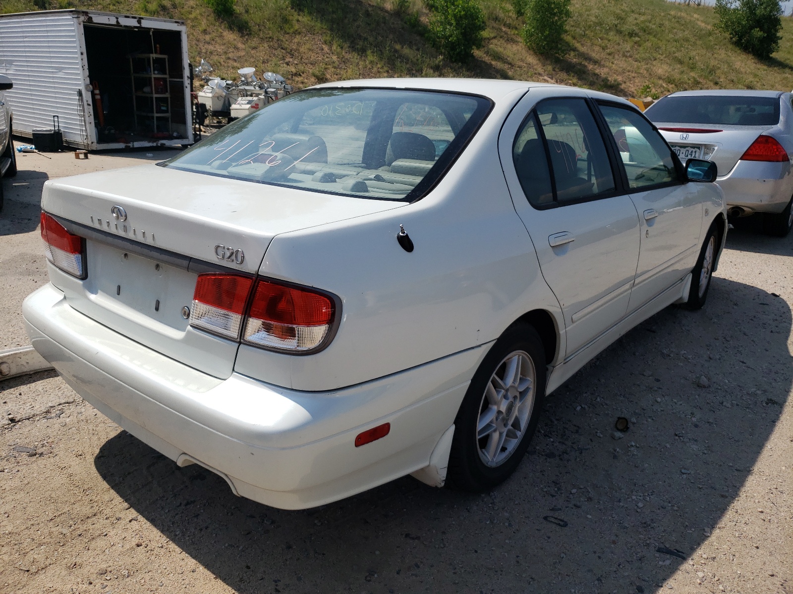 Photo 4 from auction – 2002 INFINITI G20 with VIN JNKCP11A42T504623