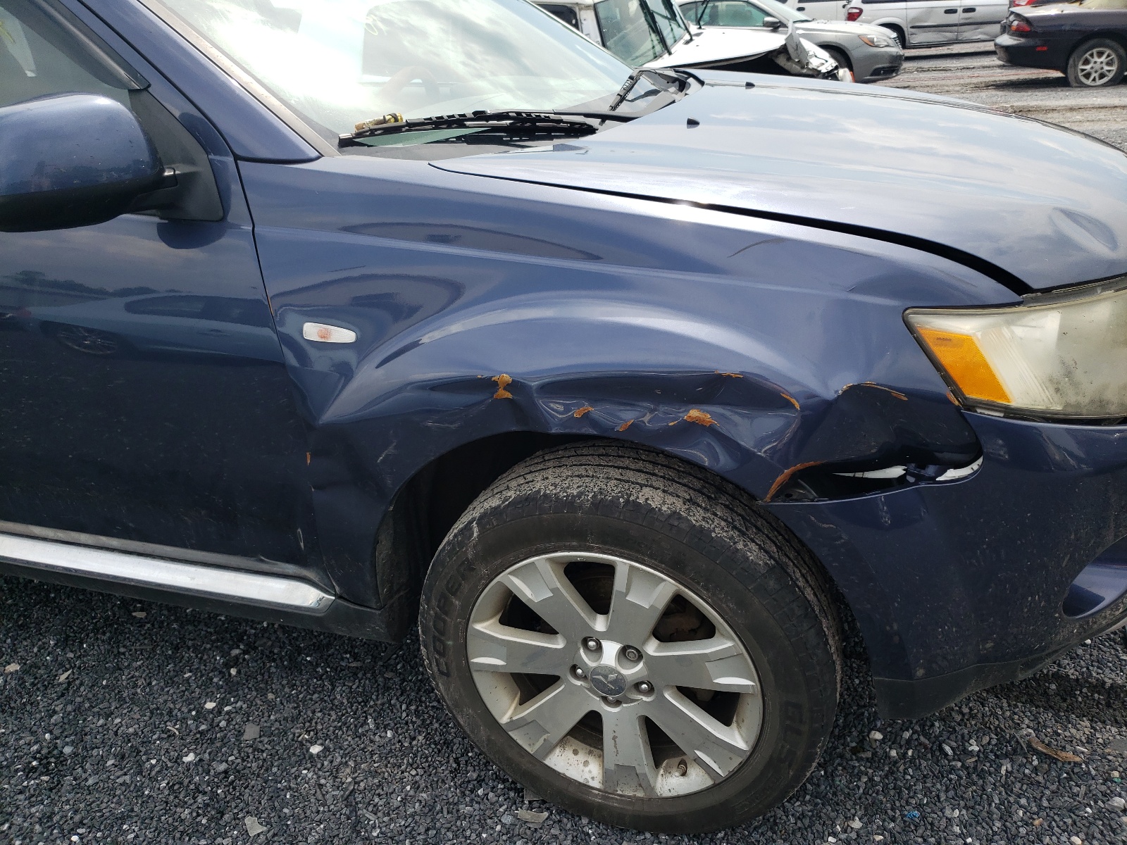 Photo 9 from auction – 2009 MITSUBISHI OUTLANDER with VIN JA4MT31W89Z006094