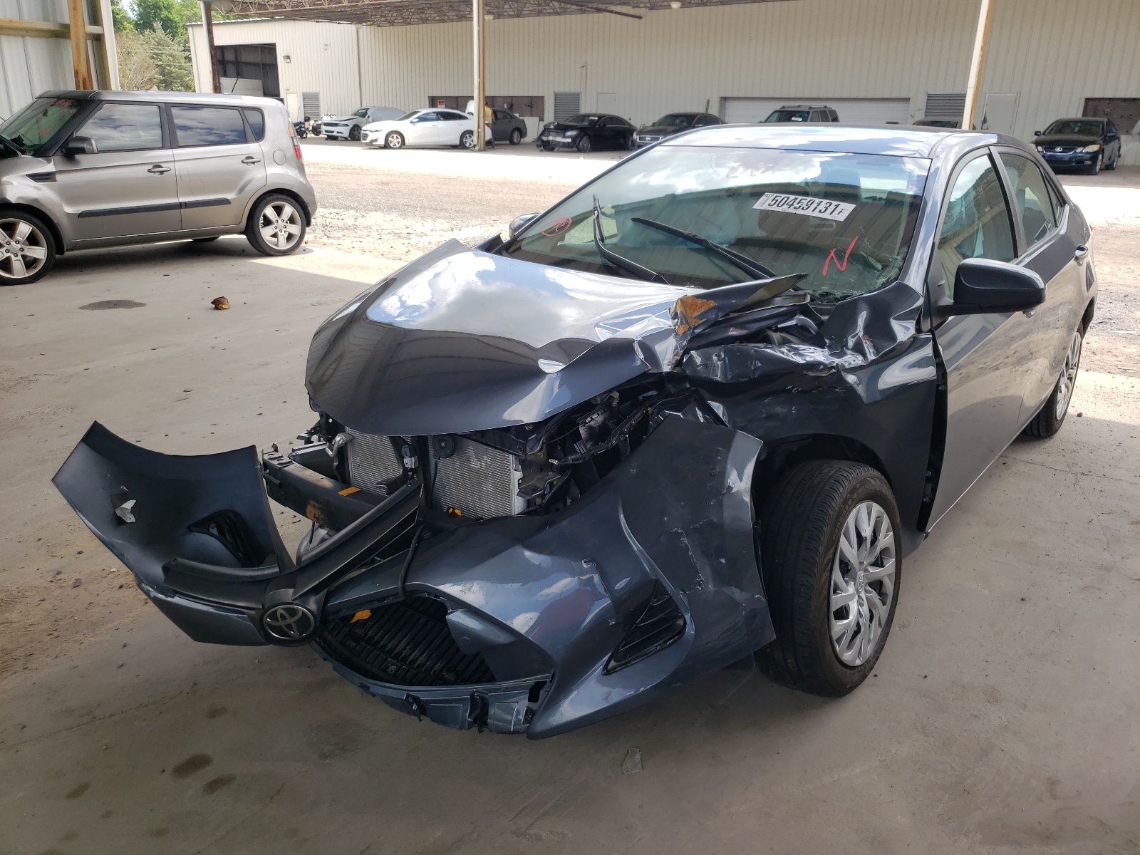 Photo 2 from auction – 2019 TOYOTA COROLLA L with VIN 5YFBURHE2KP945753