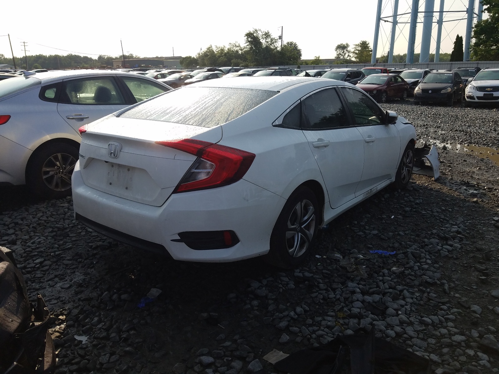 Photo 4 from auction – 2018 HONDA CIVIC LX with VIN 2HGFC2F57JH548964