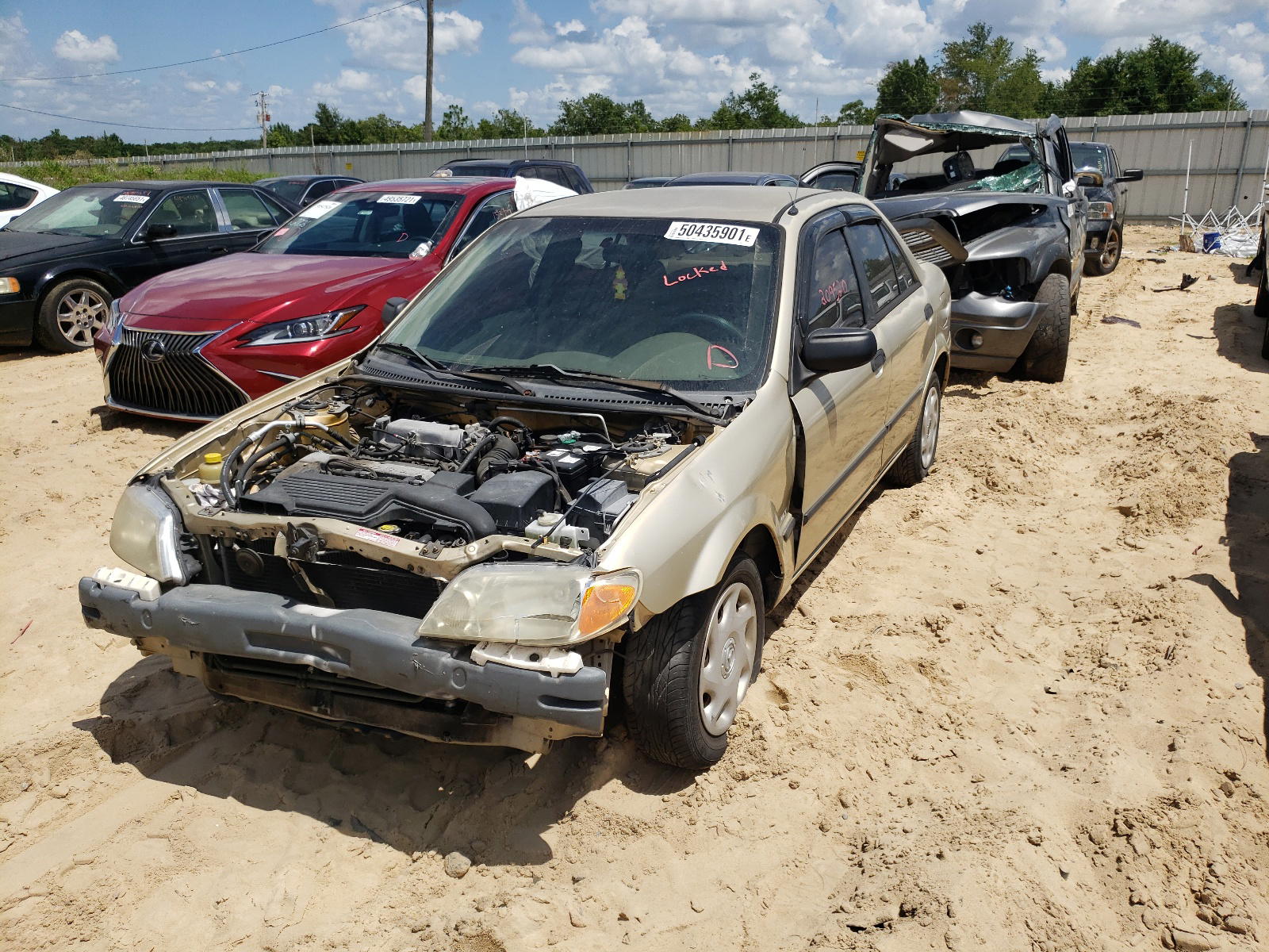 Photo 2 from auction – 2001 MAZDA PROTEGE DX with VIN JM1BJ222410410544