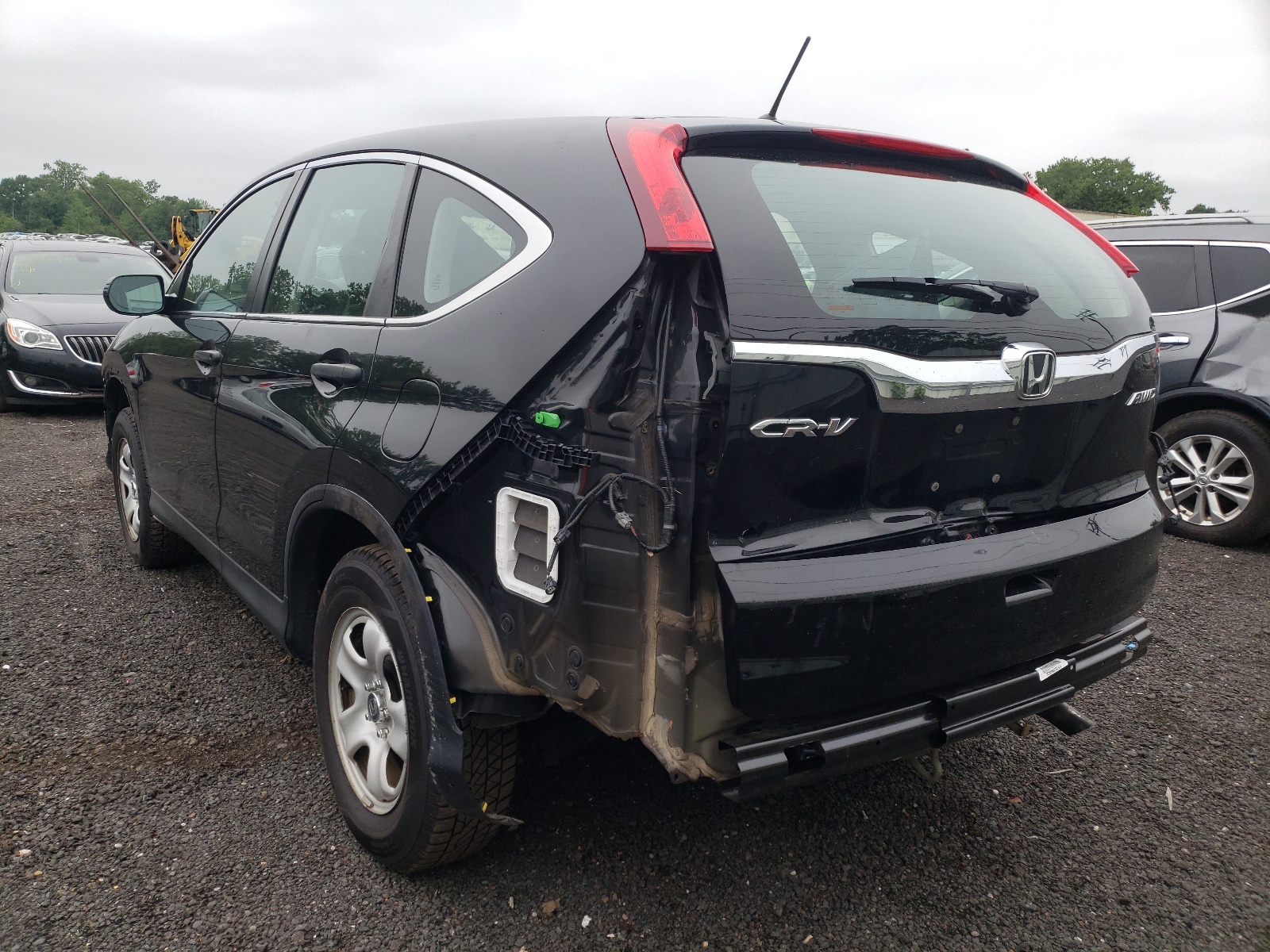Photo 3 from auction – 2016 HONDA CR-V LX with VIN 5J6RM4H36GL009810