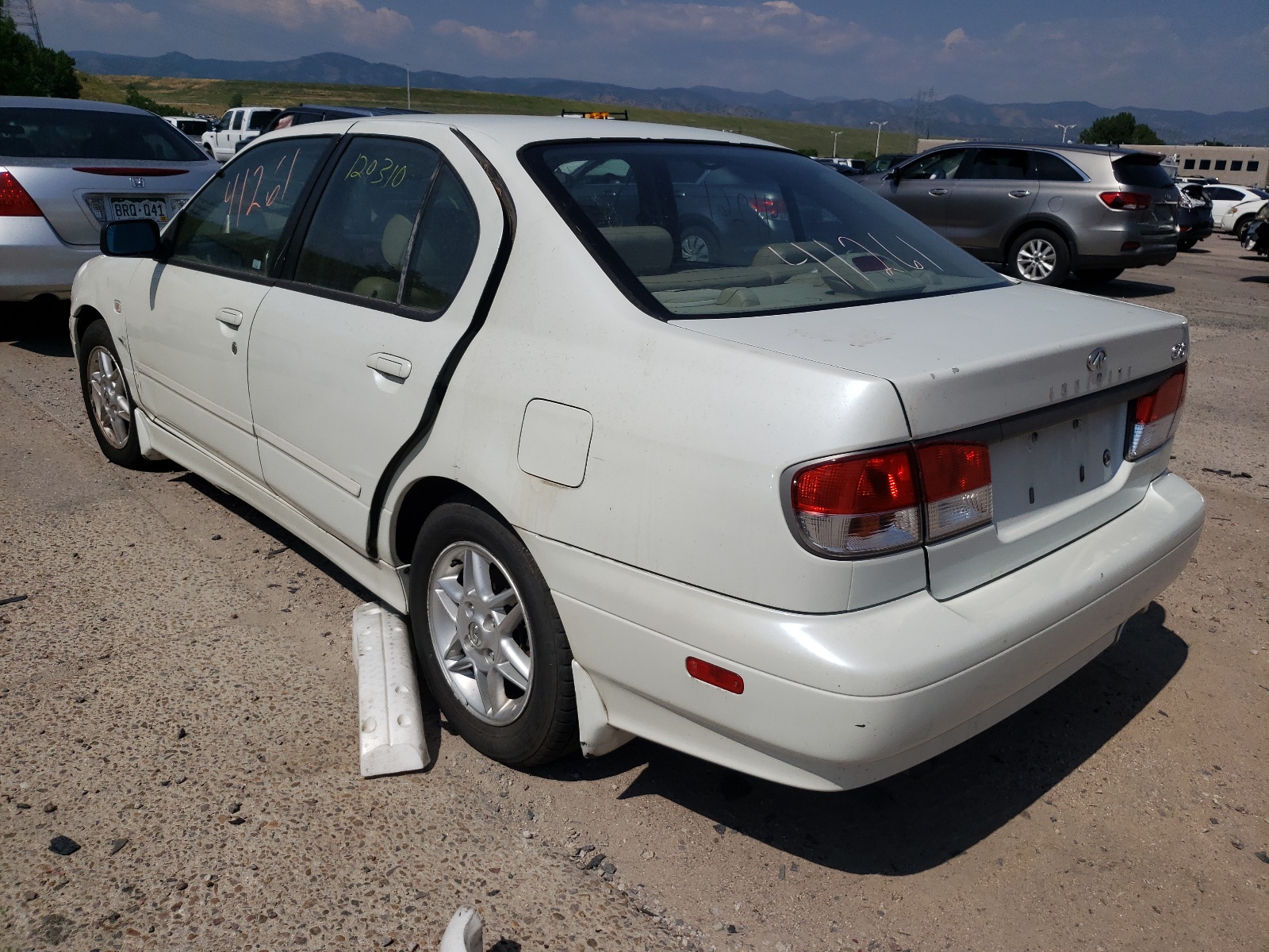 Photo 3 from auction – 2002 INFINITI G20 with VIN JNKCP11A42T504623