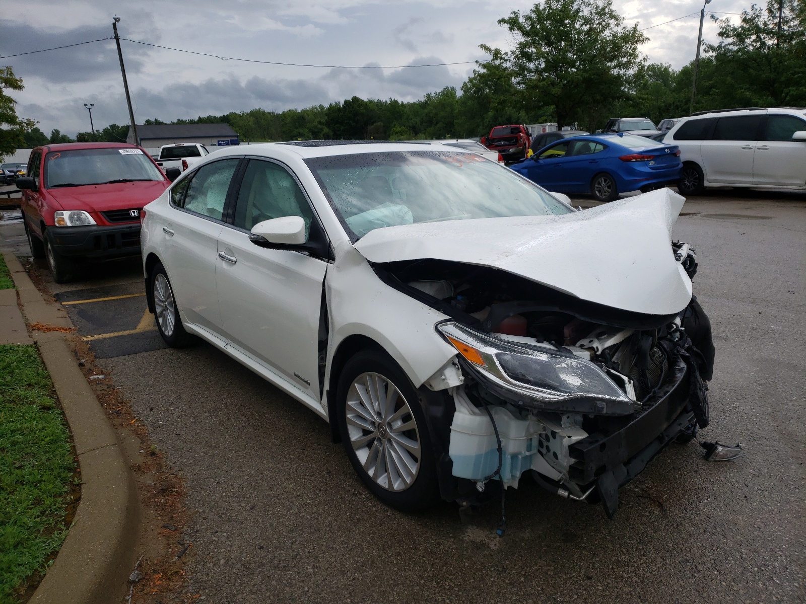 TOYOTA AVALON HYB 2013 with VIN 4T1BD1EBXDU003480 - Photo from auction