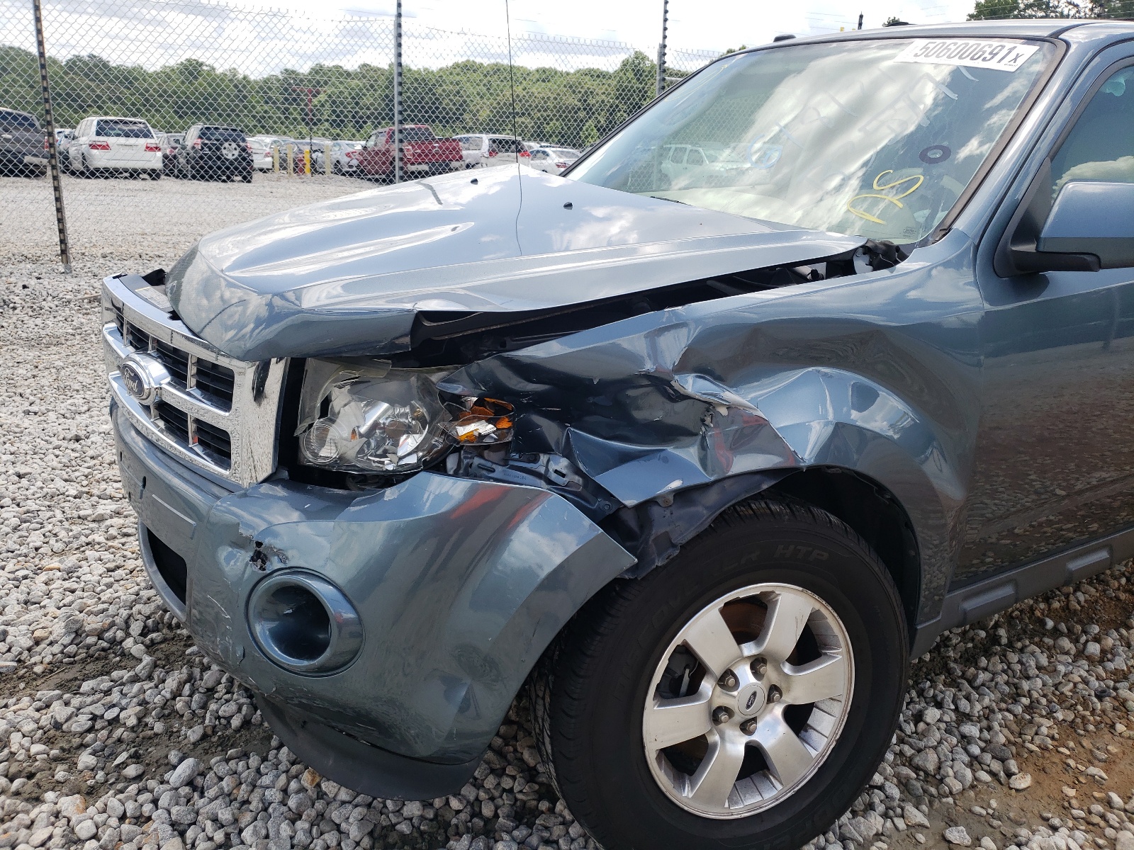 Photo 9 from auction – 2011 FORD ESCAPE LIM with VIN 1FMCU9EG3BKB35777