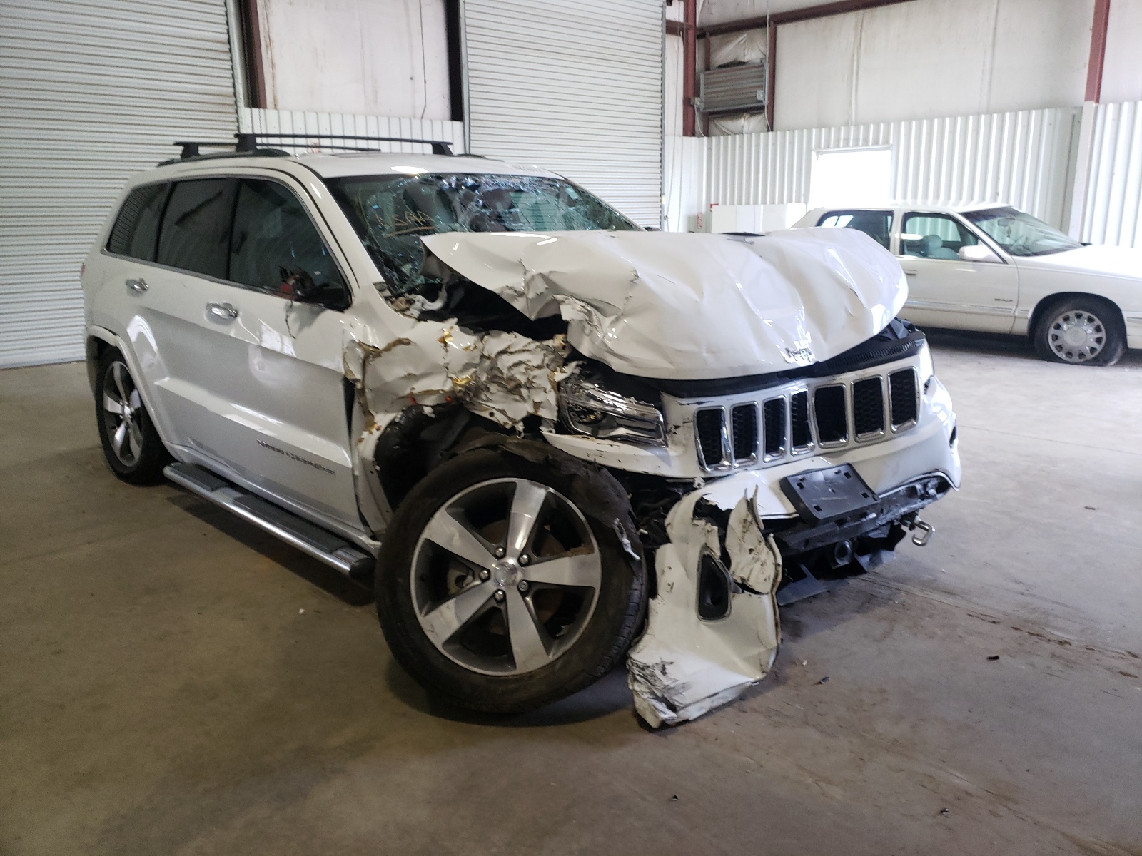 JEEP GRAND CHER 2016 with VIN 1C4RJFCG2GC469891 - Photo from auction