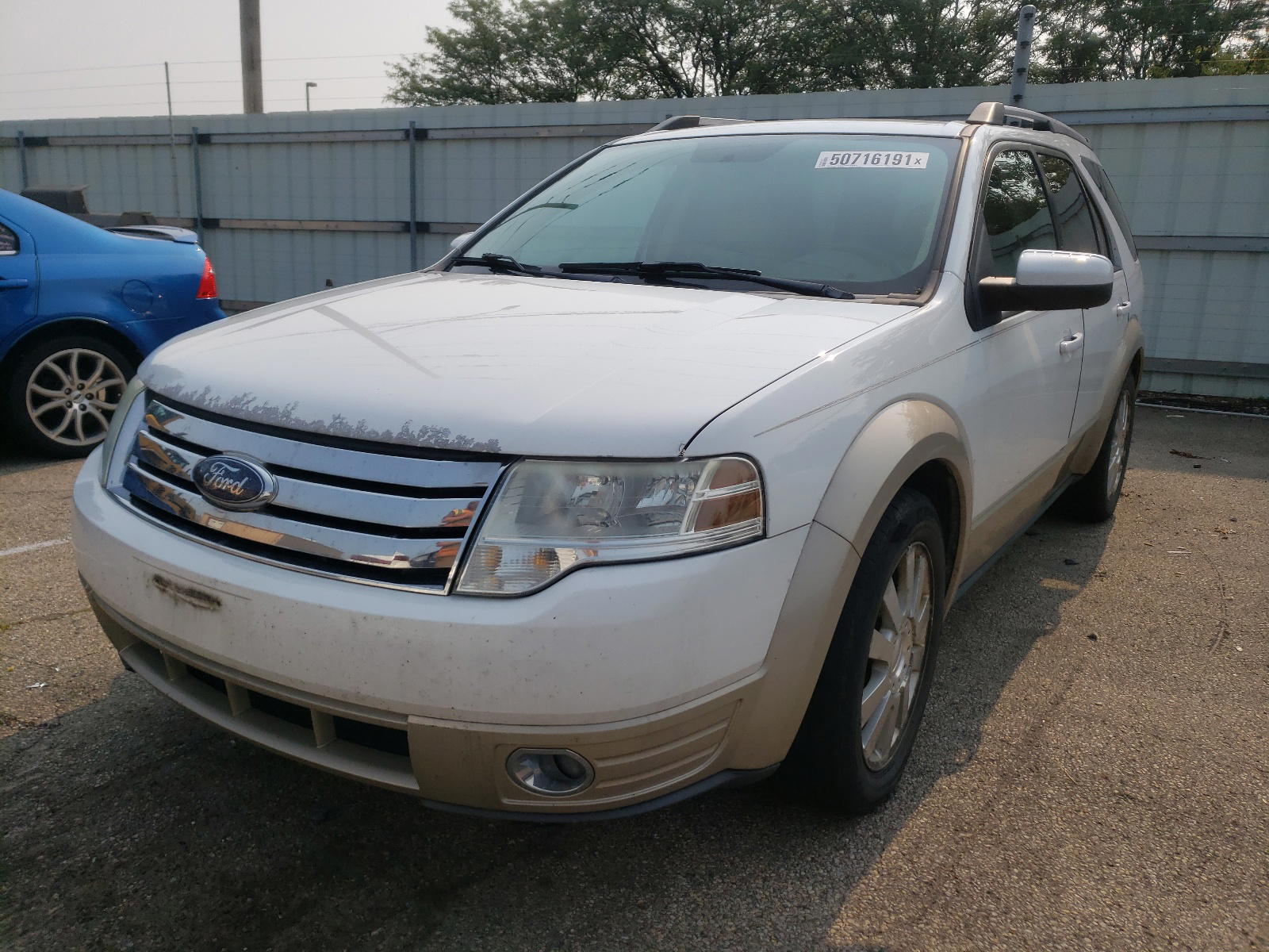 Photo 2 from auction – 2008 FORD TAURUS X E with VIN 1FMDK07W48GA28114