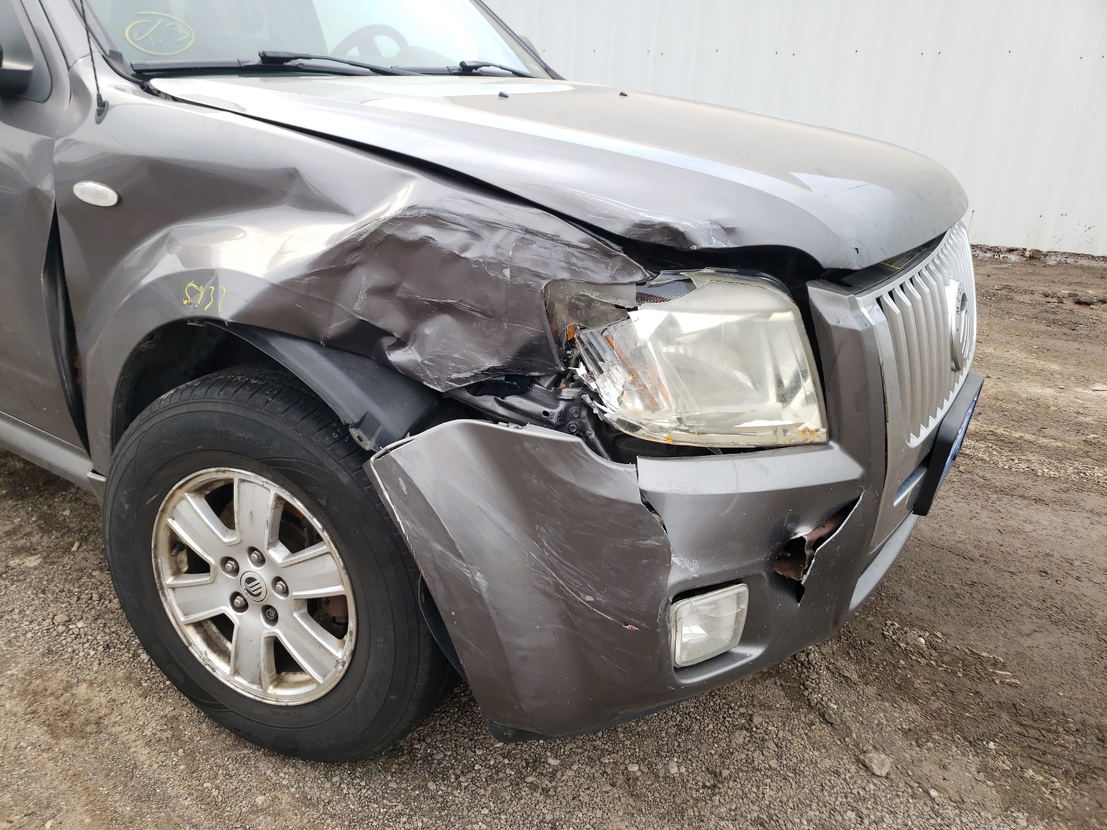 Photo 9 from auction – 2009 MERCURY MARINER with VIN 4M2CU81719KJ25645