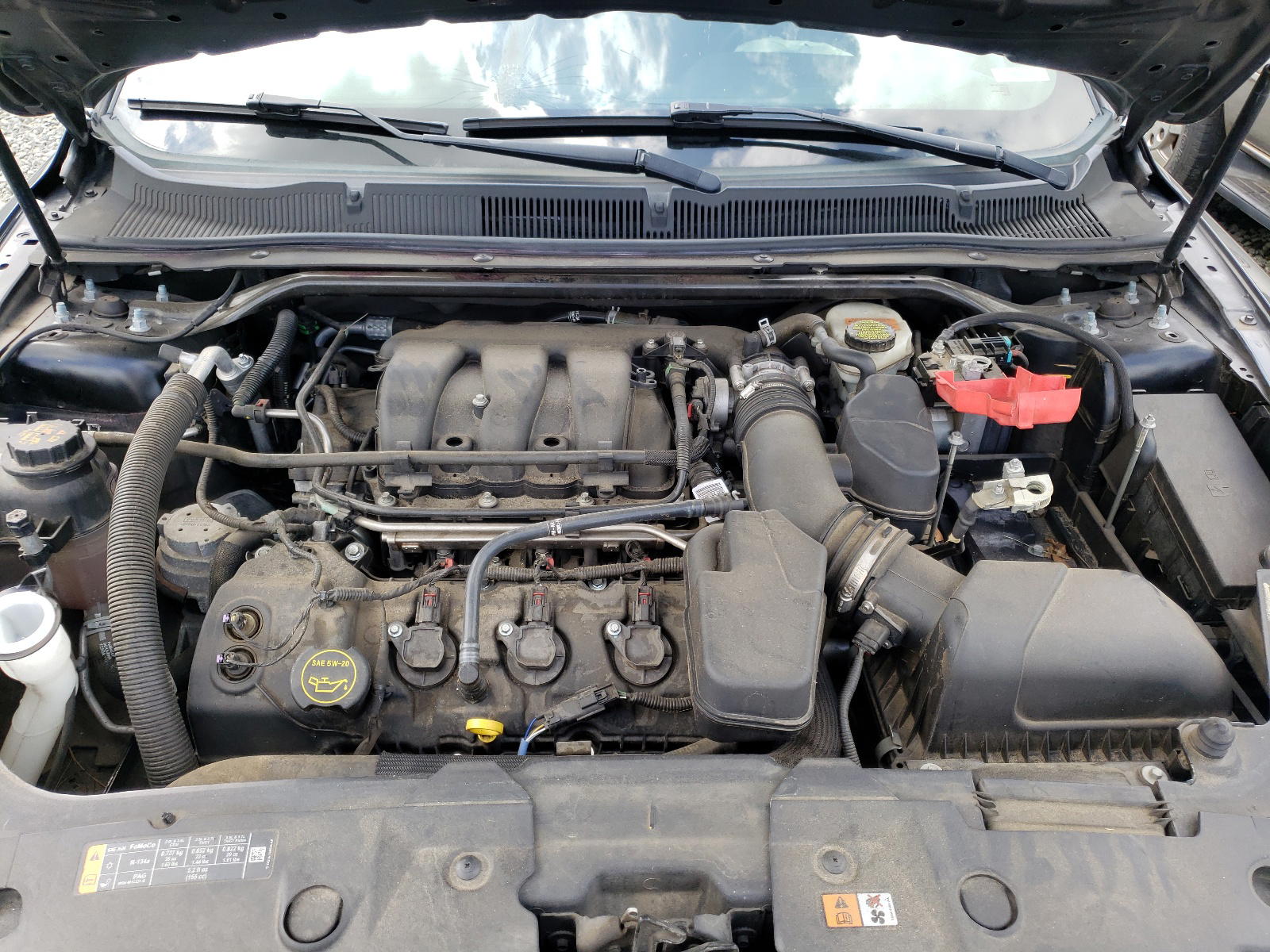 Photo 7 from auction – 2015 FORD TAURUS SEL with VIN 1FAHP2E83FG160890
