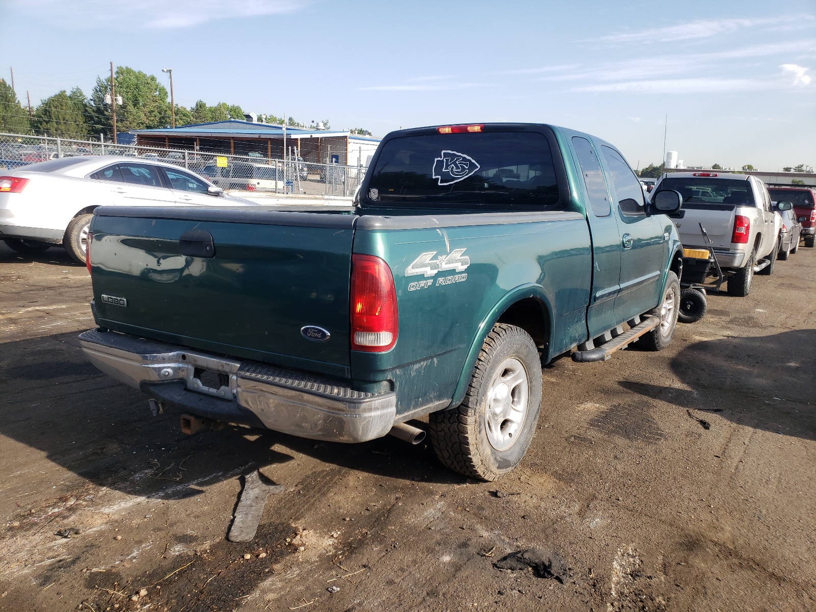 Photo 4 from auction – 1999 FORD F150 with VIN 1FTRX18LXXNA87751