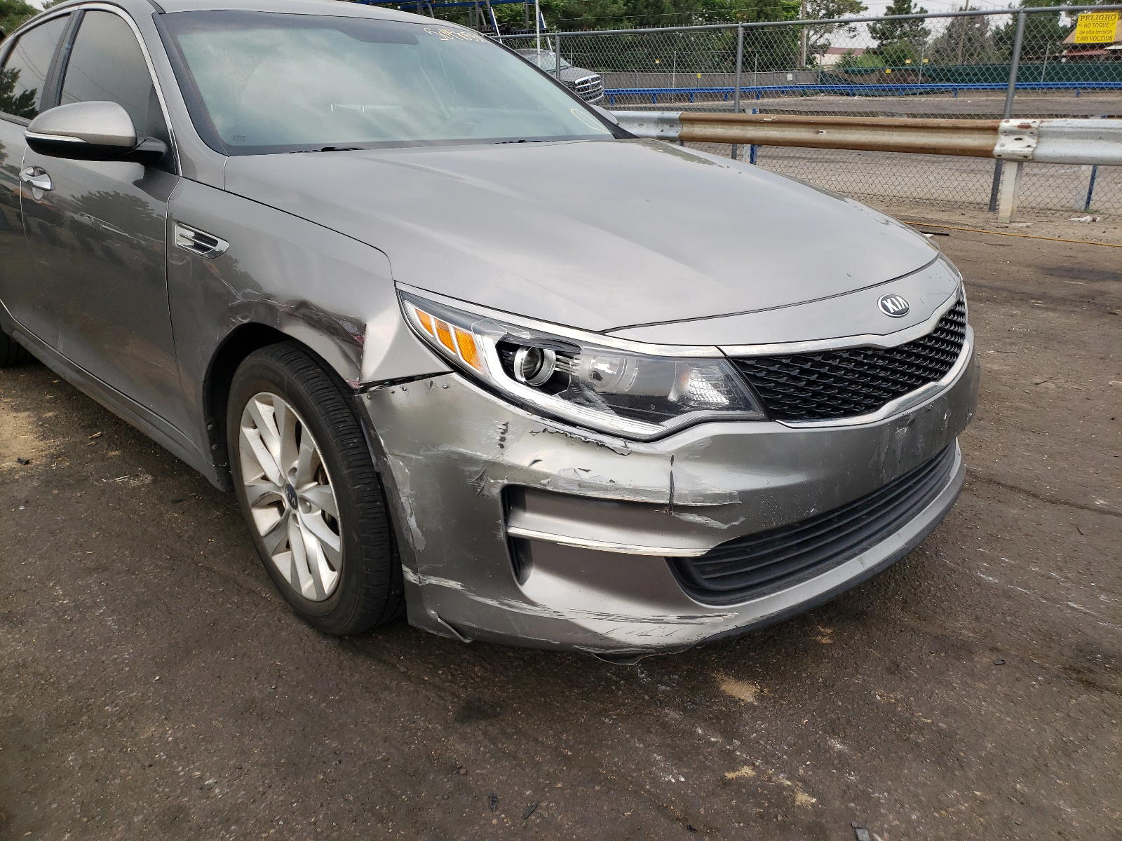 Photo 9 from auction – 2016 KIA OPTIMA with VIN 5XXGT4L32GG044013