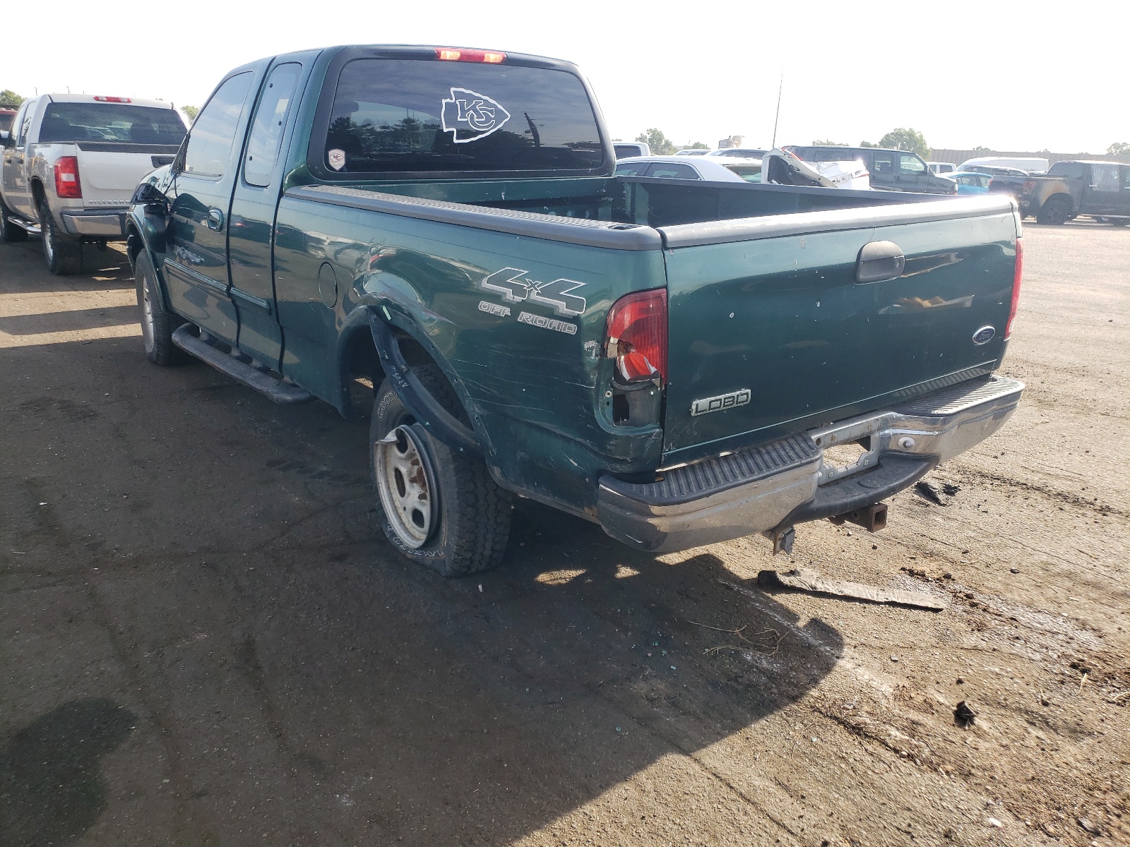 Photo 9 from auction – 1999 FORD F150 with VIN 1FTRX18LXXNA87751