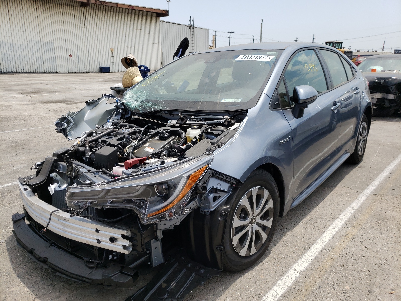 Photo 2 from auction – 2021 TOYOTA COROLLA LE with VIN JTDEAMDE5MJ027226