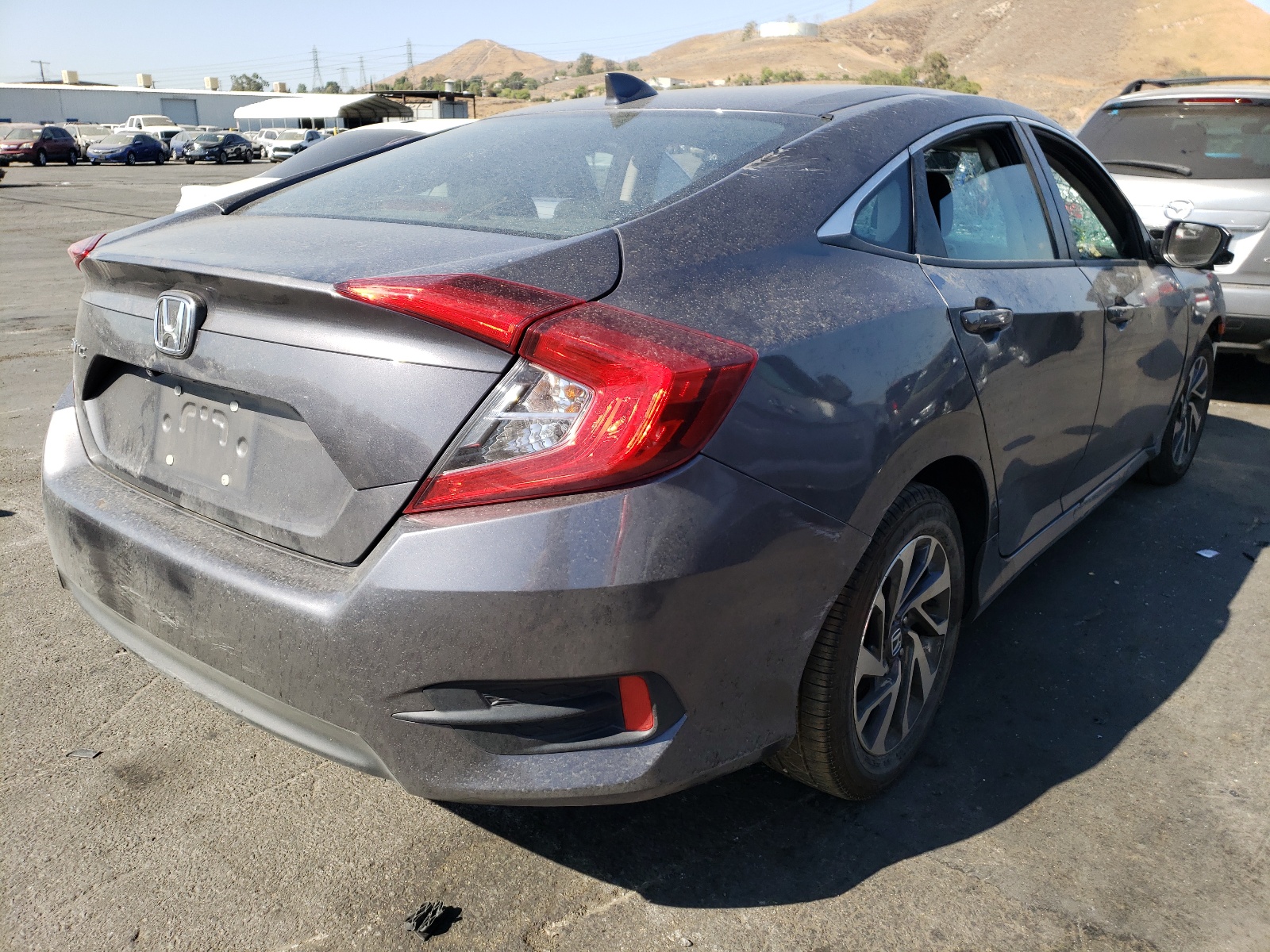 Photo 4 from auction – 2018 HONDA CIVIC EX with VIN 2HGFC2F70JH542831