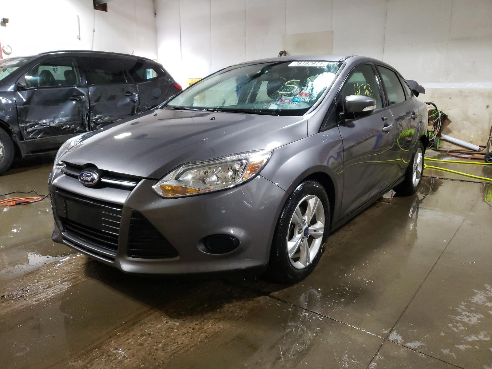Photo 2 from auction – 2014 FORD FOCUS SE with VIN 1FADP3F27EL107209