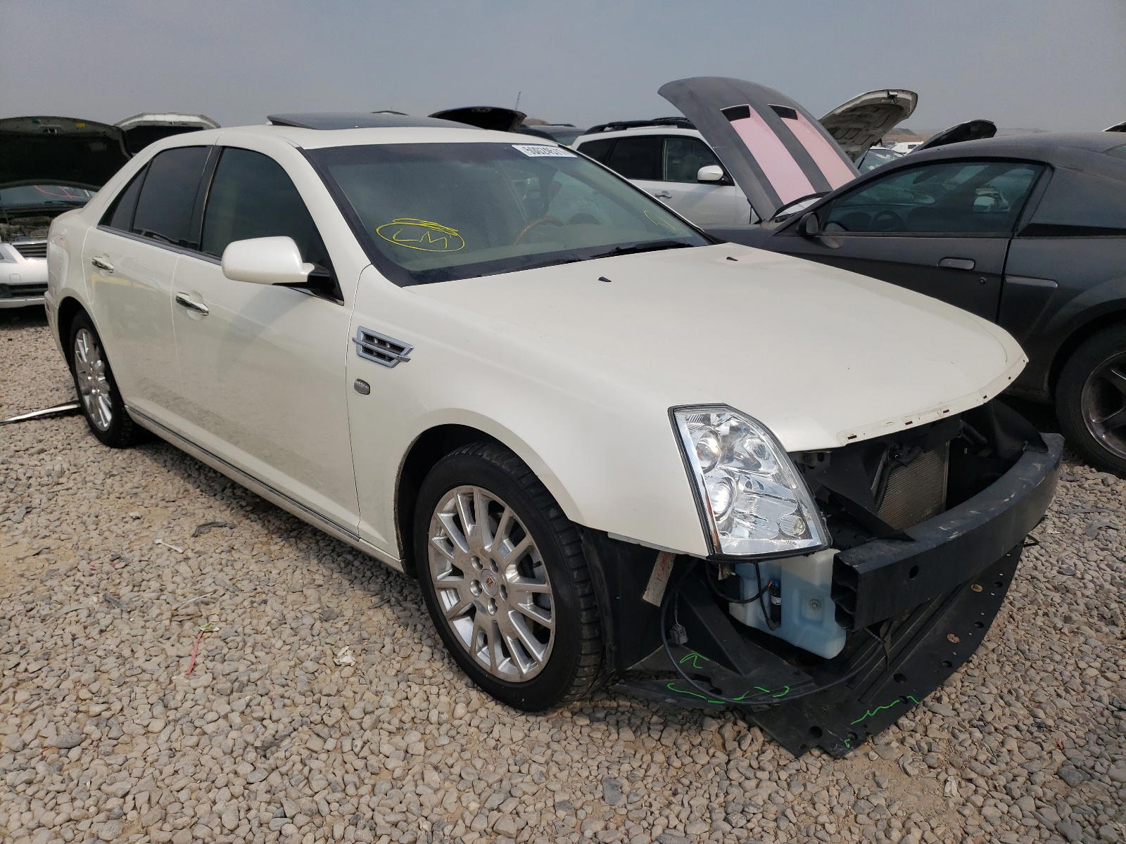 CADILLAC STS 2010 with VIN 1G6DU6EV1A0105356 - Photo from auction