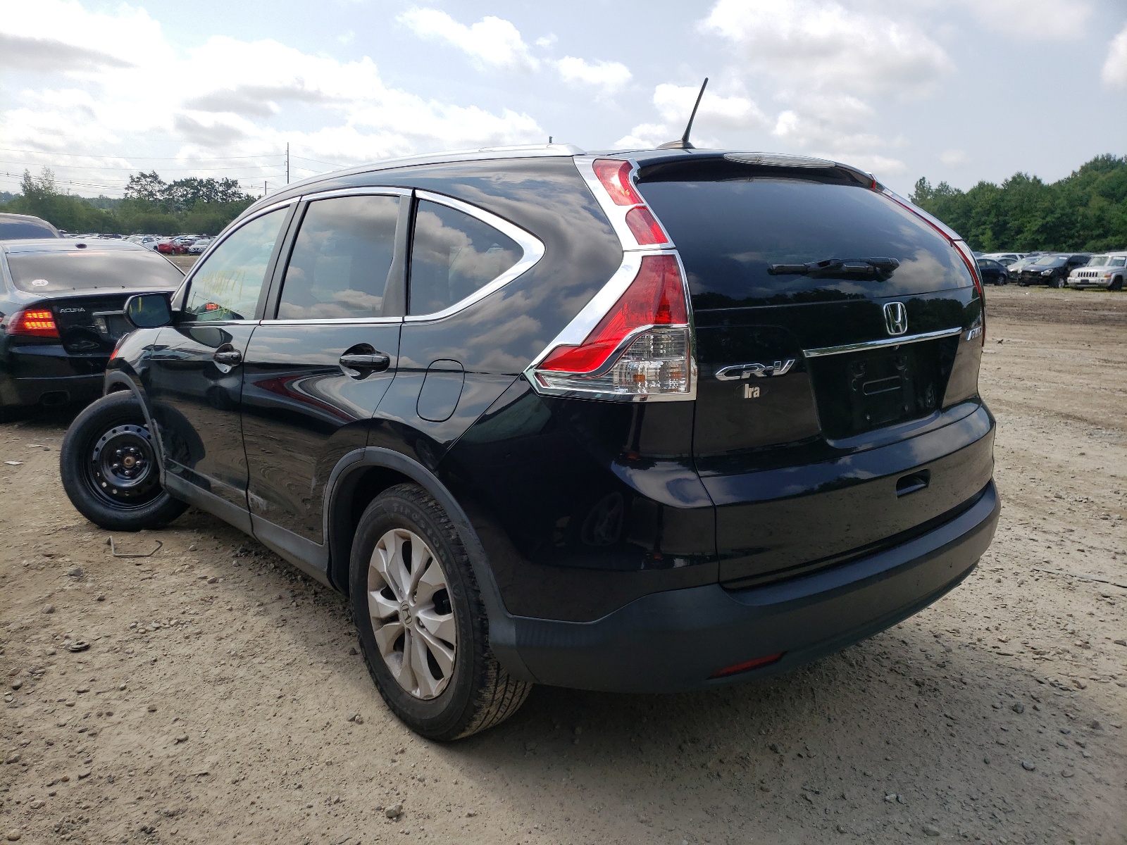 Photo 3 from auction – 2014 HONDA CR-V EXL with VIN 2HKRM4H73EH722271