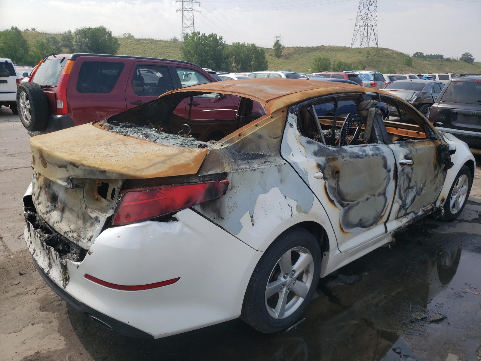 Photo 4 from auction – 2015 KIA OPTIMA LX with VIN KNAGM4A77F5639202