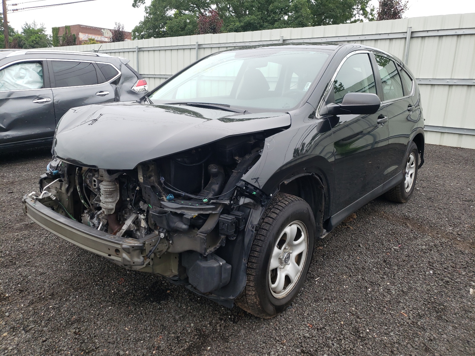 Photo 2 from auction – 2016 HONDA CR-V LX with VIN 5J6RM4H36GL009810
