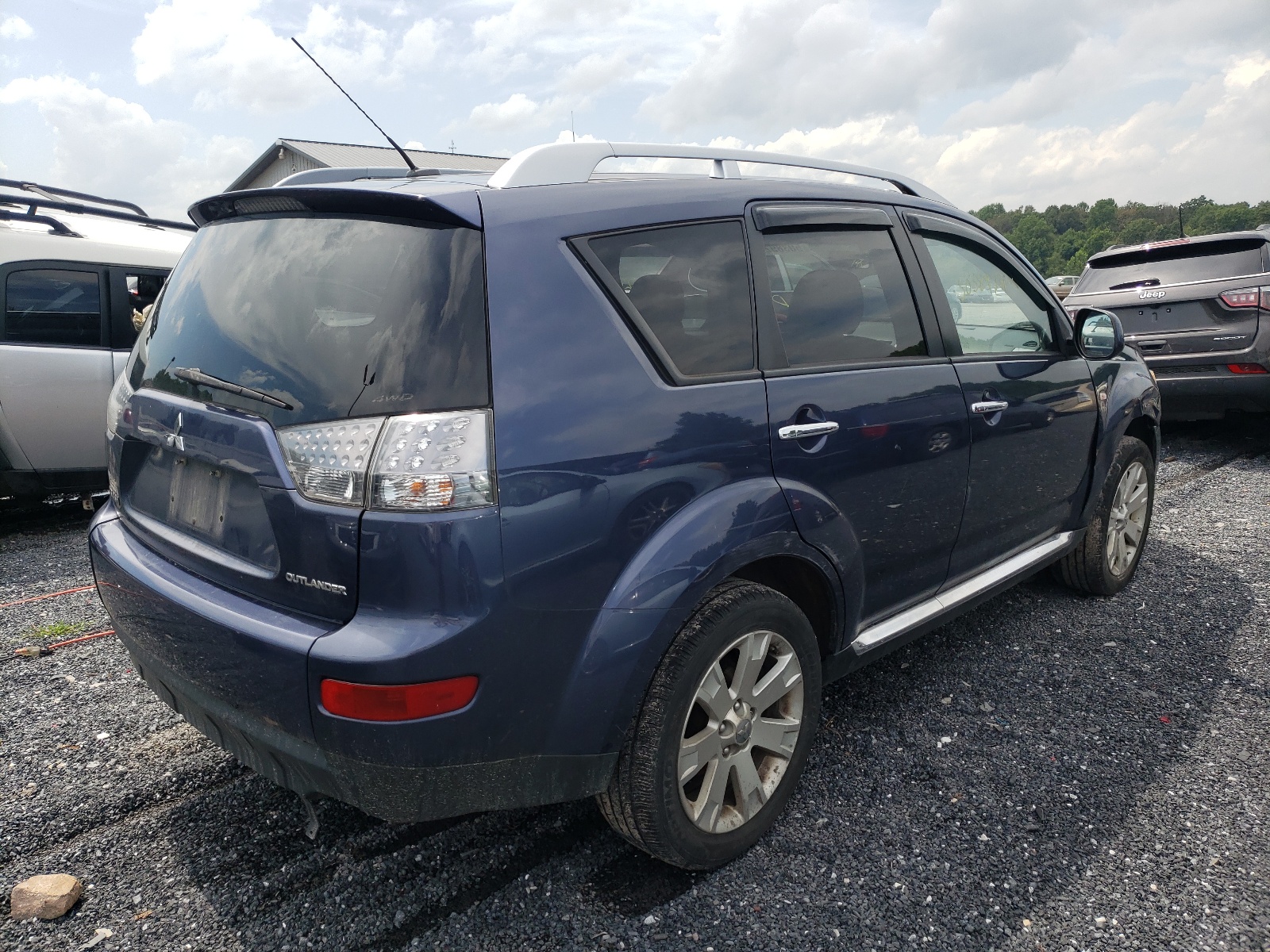 Photo 4 from auction – 2009 MITSUBISHI OUTLANDER with VIN JA4MT31W89Z006094