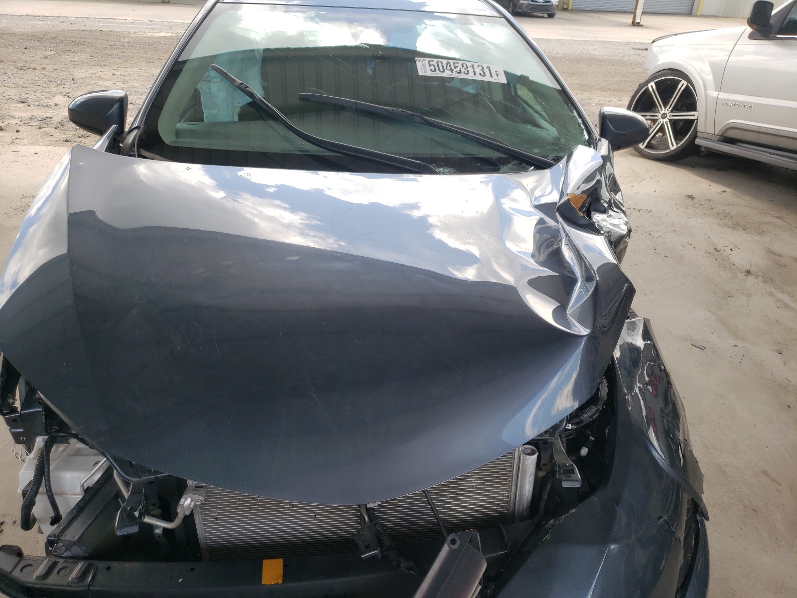 Photo 7 from auction – 2019 TOYOTA COROLLA L with VIN 5YFBURHE2KP945753