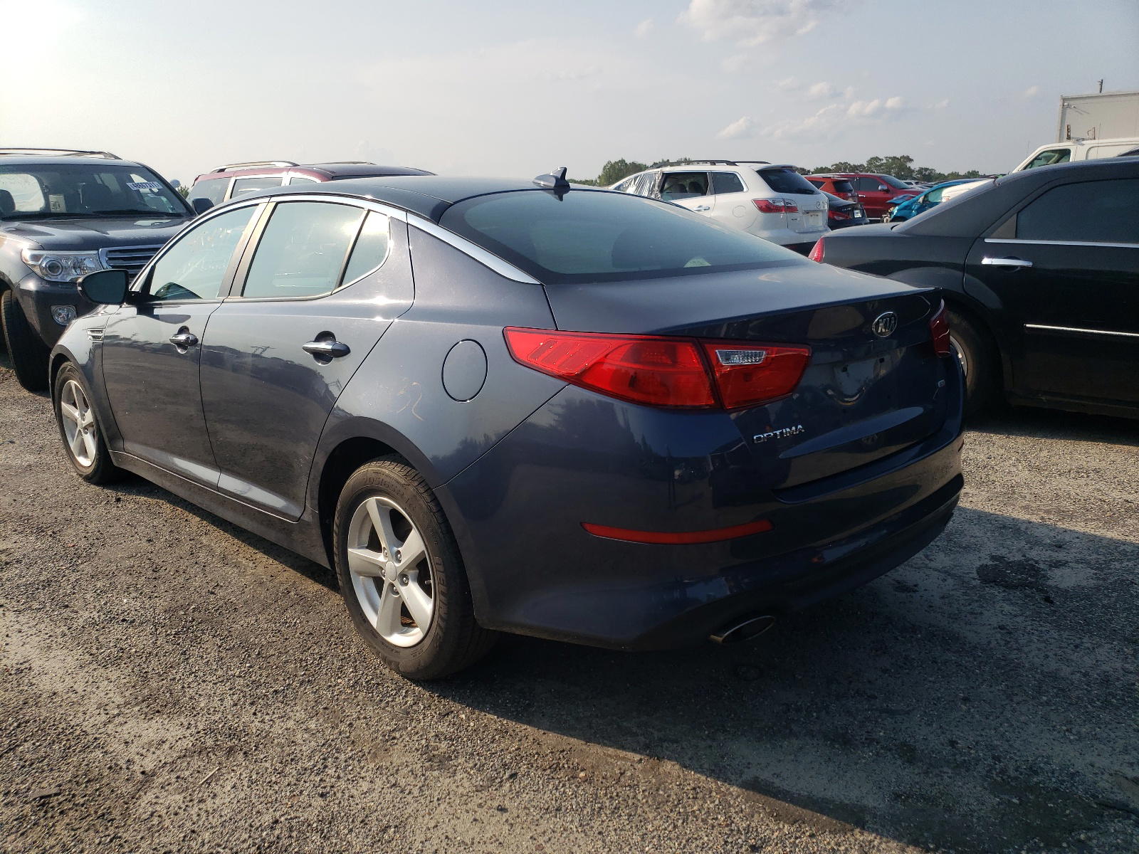 Photo 3 from auction – 2015 KIA OPTIMA LX with VIN KNAGM4A75F5546744