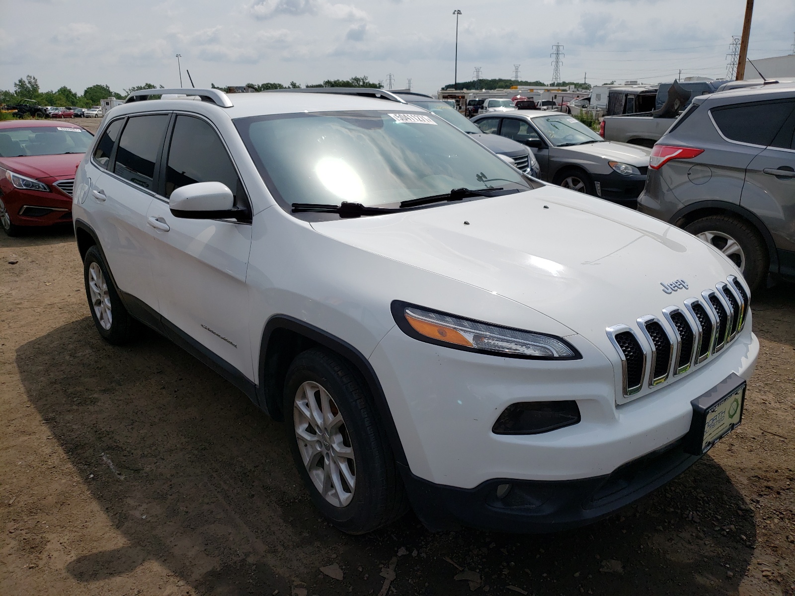 JEEP CHEROKEE L 2015 with VIN 1C4PJLCB4FW655746 - Photo from auction