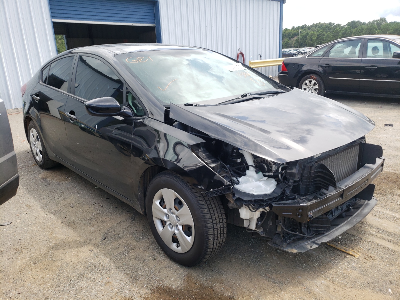 KIA FORTE LX 2017 with VIN 3KPFK4A77HE151167 - Photo from auction