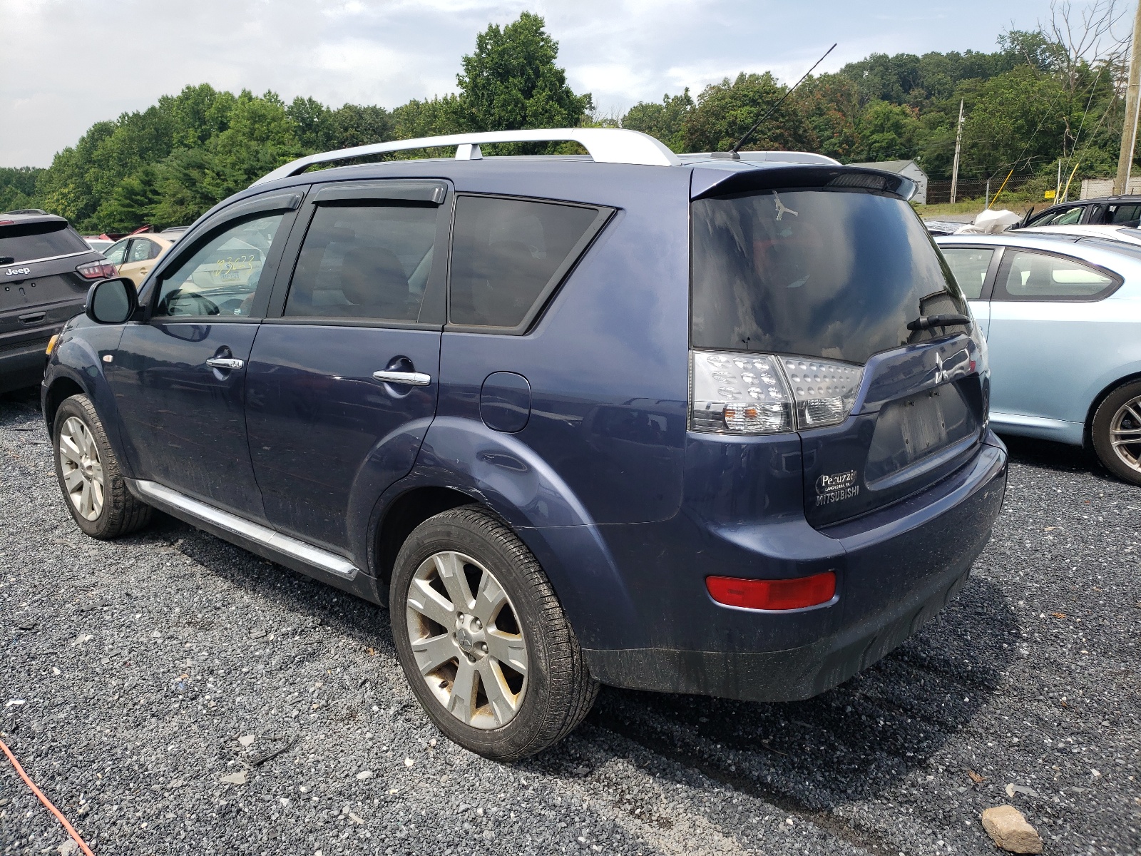 Photo 3 from auction – 2009 MITSUBISHI OUTLANDER with VIN JA4MT31W89Z006094