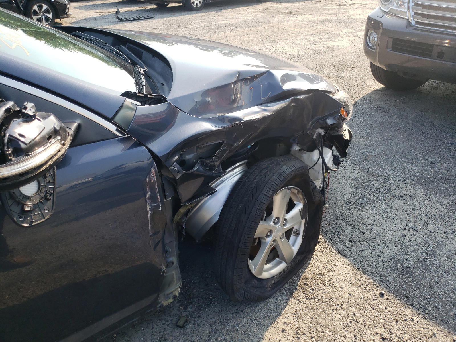Photo 9 from auction – 2015 KIA OPTIMA LX with VIN KNAGM4A75F5546744