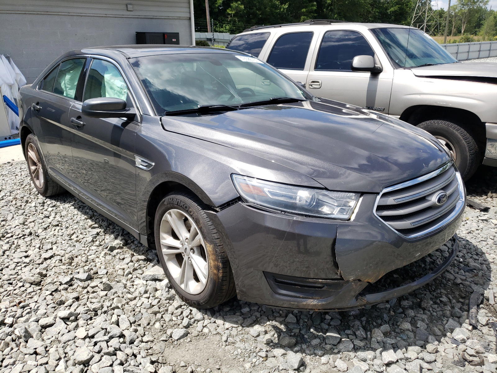 FORD TAURUS SEL 2015 with VIN 1FAHP2E83FG160890 - Photo from auction