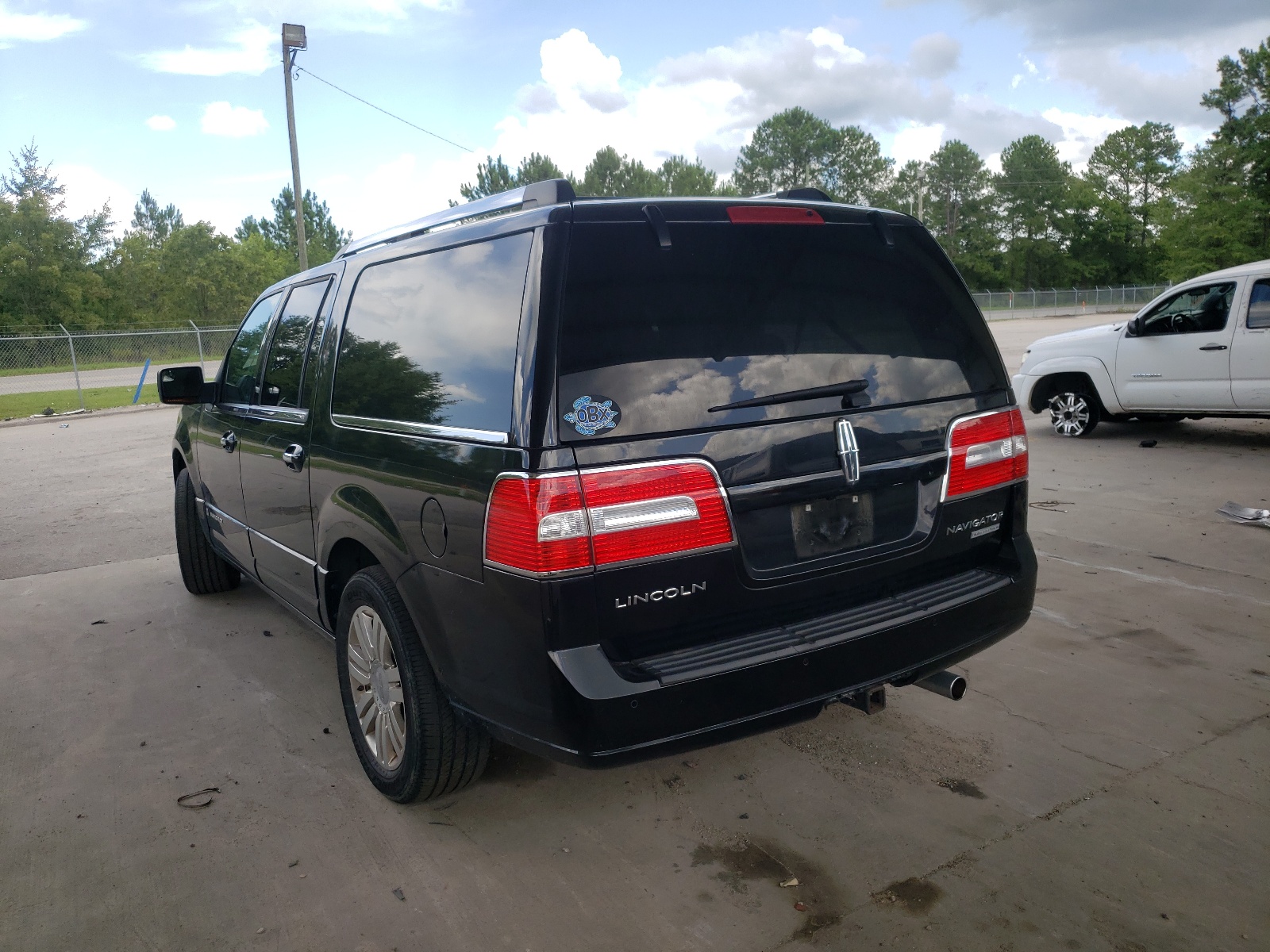 Photo 3 from auction – 2014 LINCOLN NAVIGATOR with VIN 5LMJJ3J59EEL03732