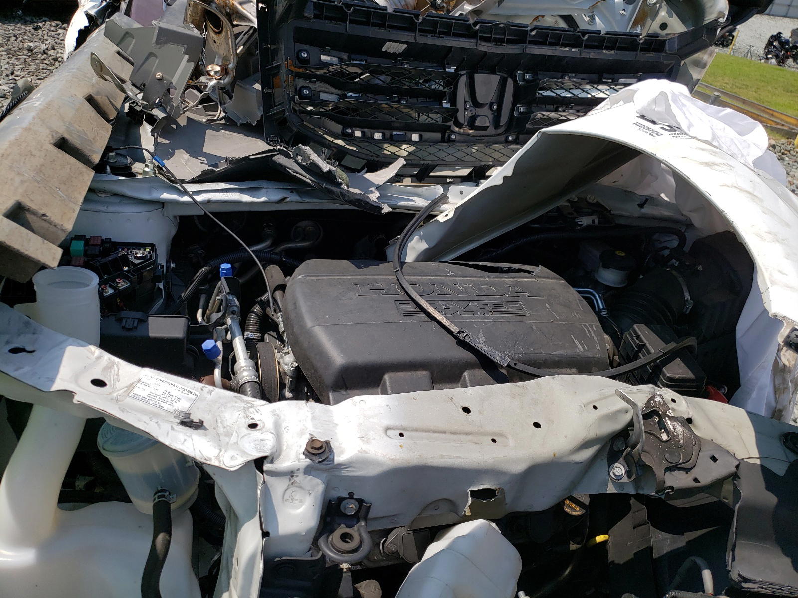 Photo 7 from auction – 2014 HONDA PILOT LX with VIN 5FNYF4H21EB035556