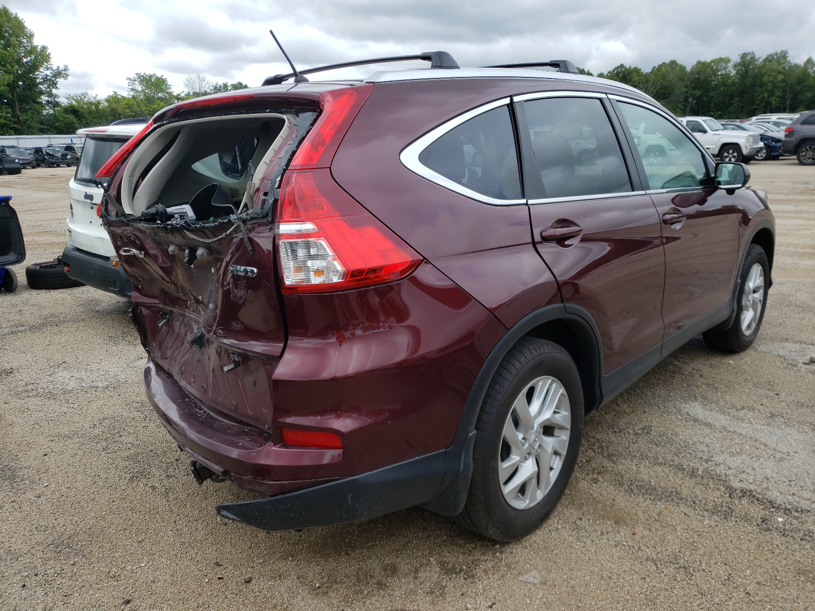 Photo 4 from auction – 2016 HONDA CR-V with VIN 5J6RM4H55GL028723